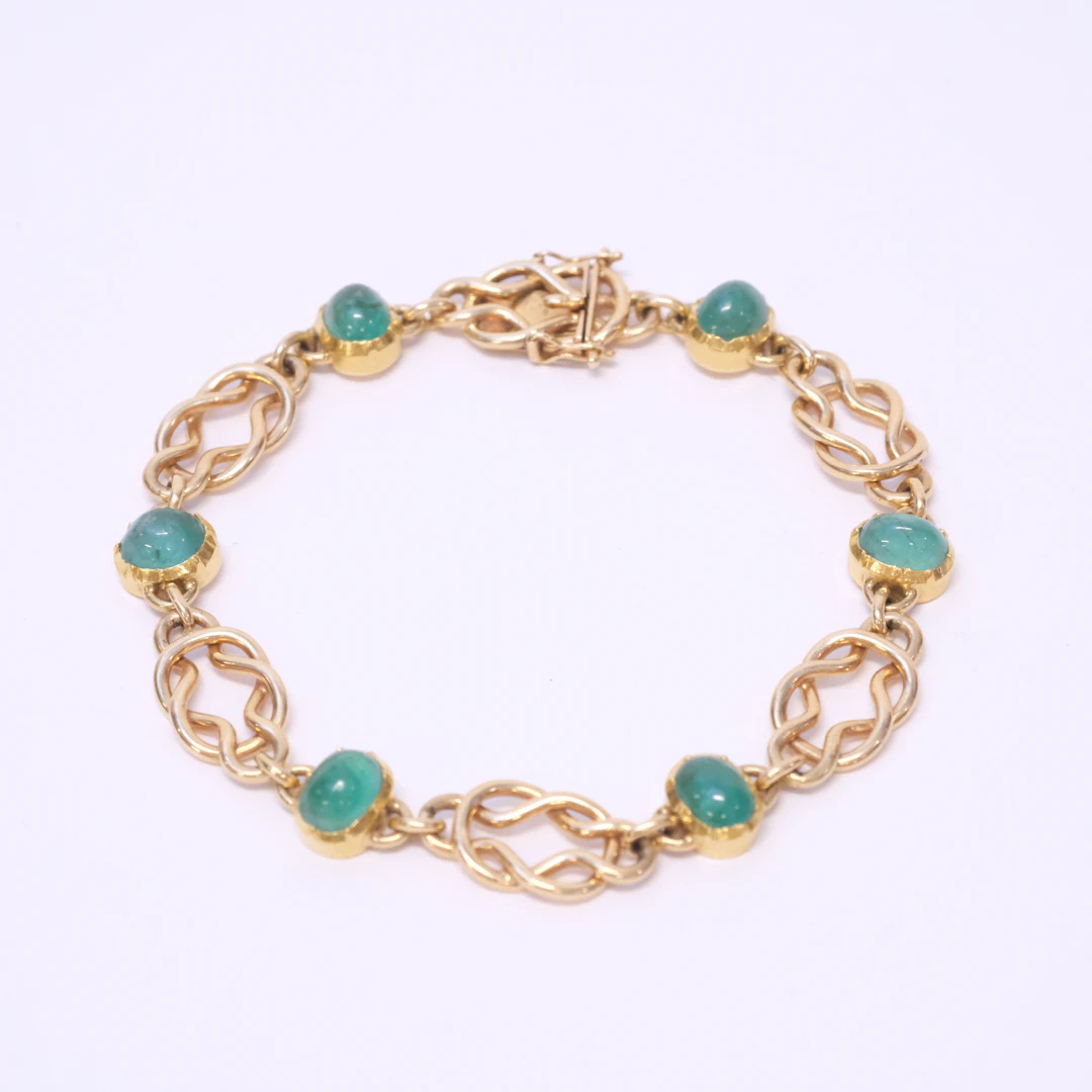 ARMBAND, 18K GULD, CABOCHONSLIPADE SMARAGDER.