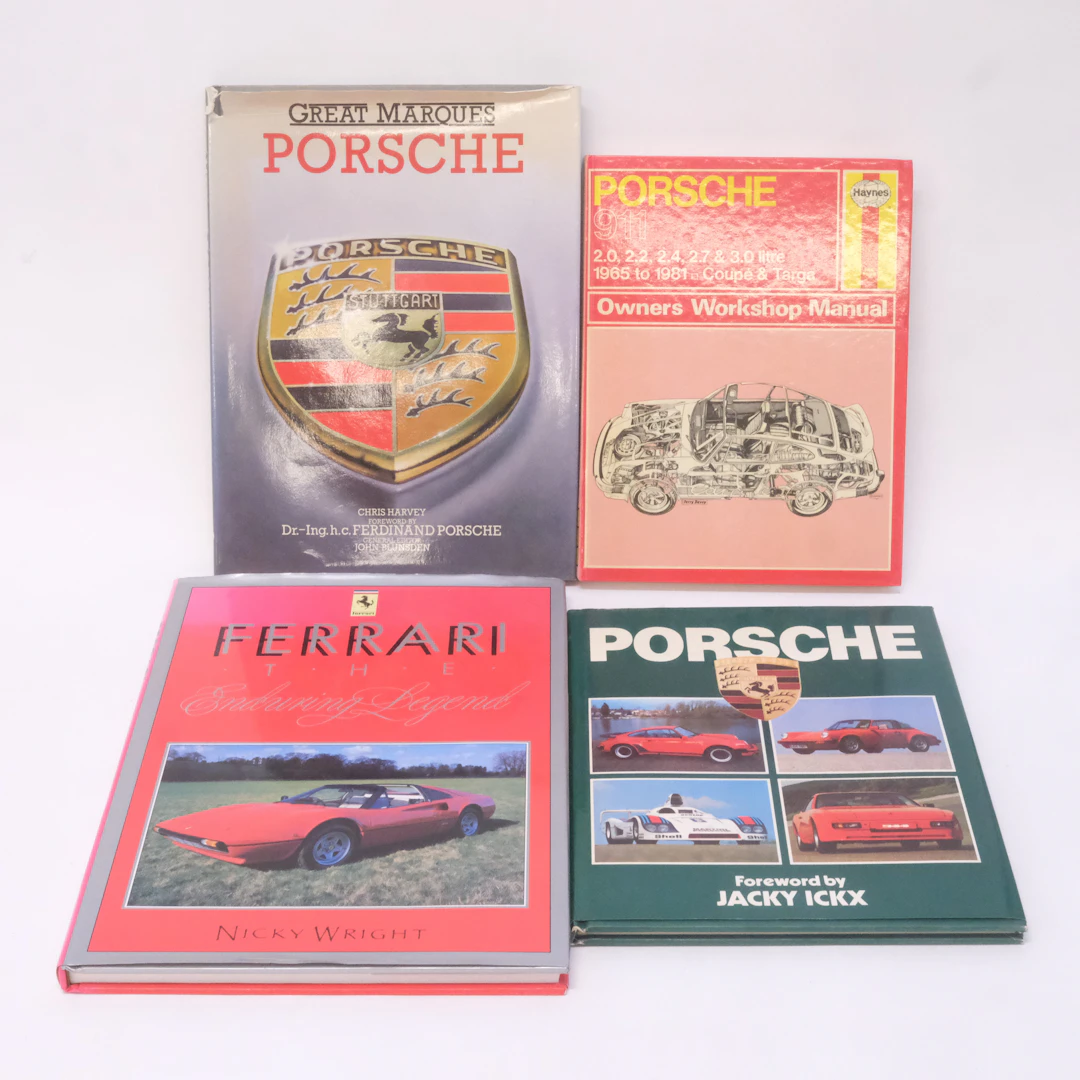 FYRA BÖCKER OM PORSCHE OCH FERRARI.