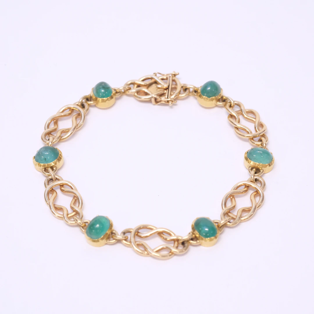 ARMBAND, 18K GULD, CABOCHONSLIPADE SMARAGDER.