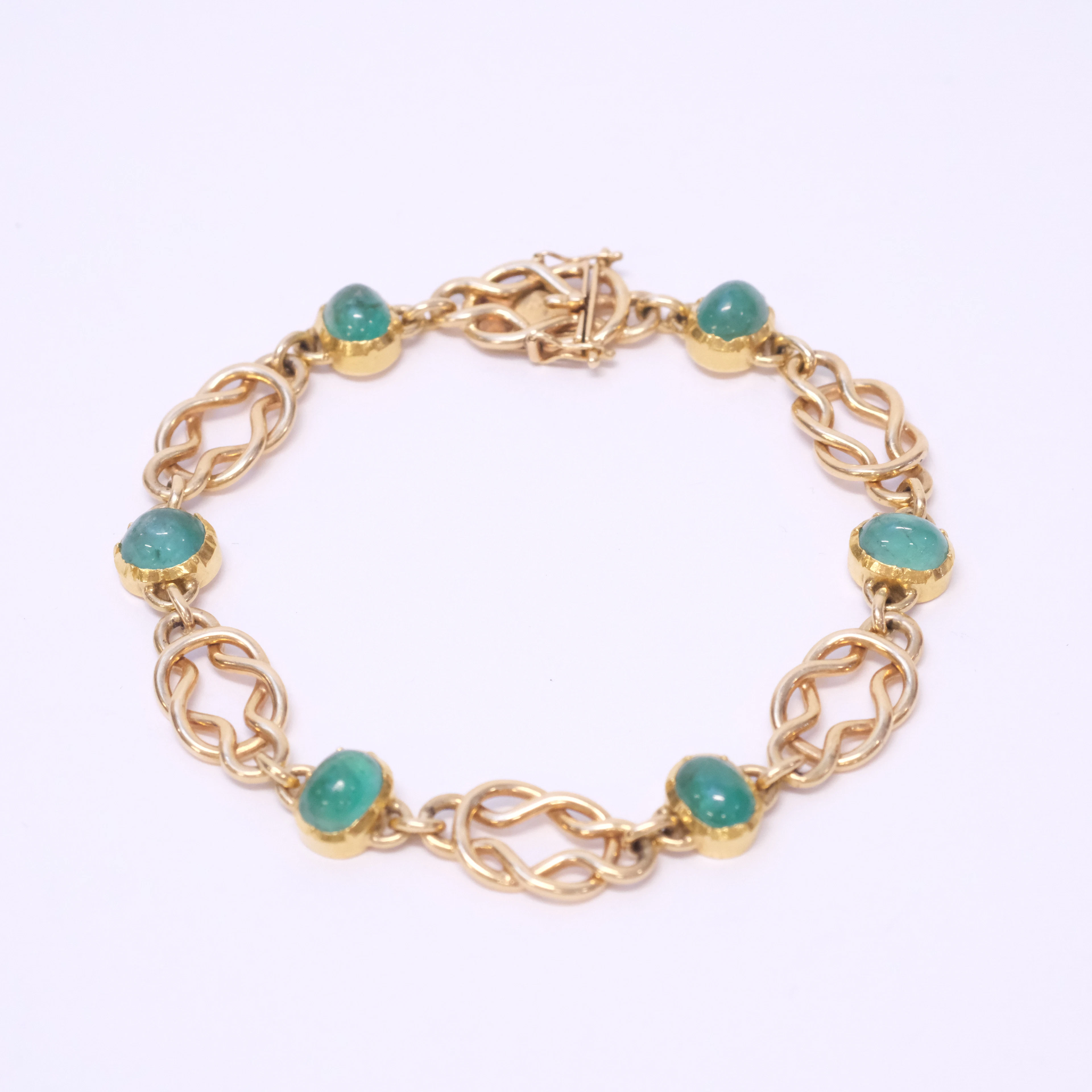 ARMBAND, 18K GULD, CABOCHONSLIPADE SMARAGDER.