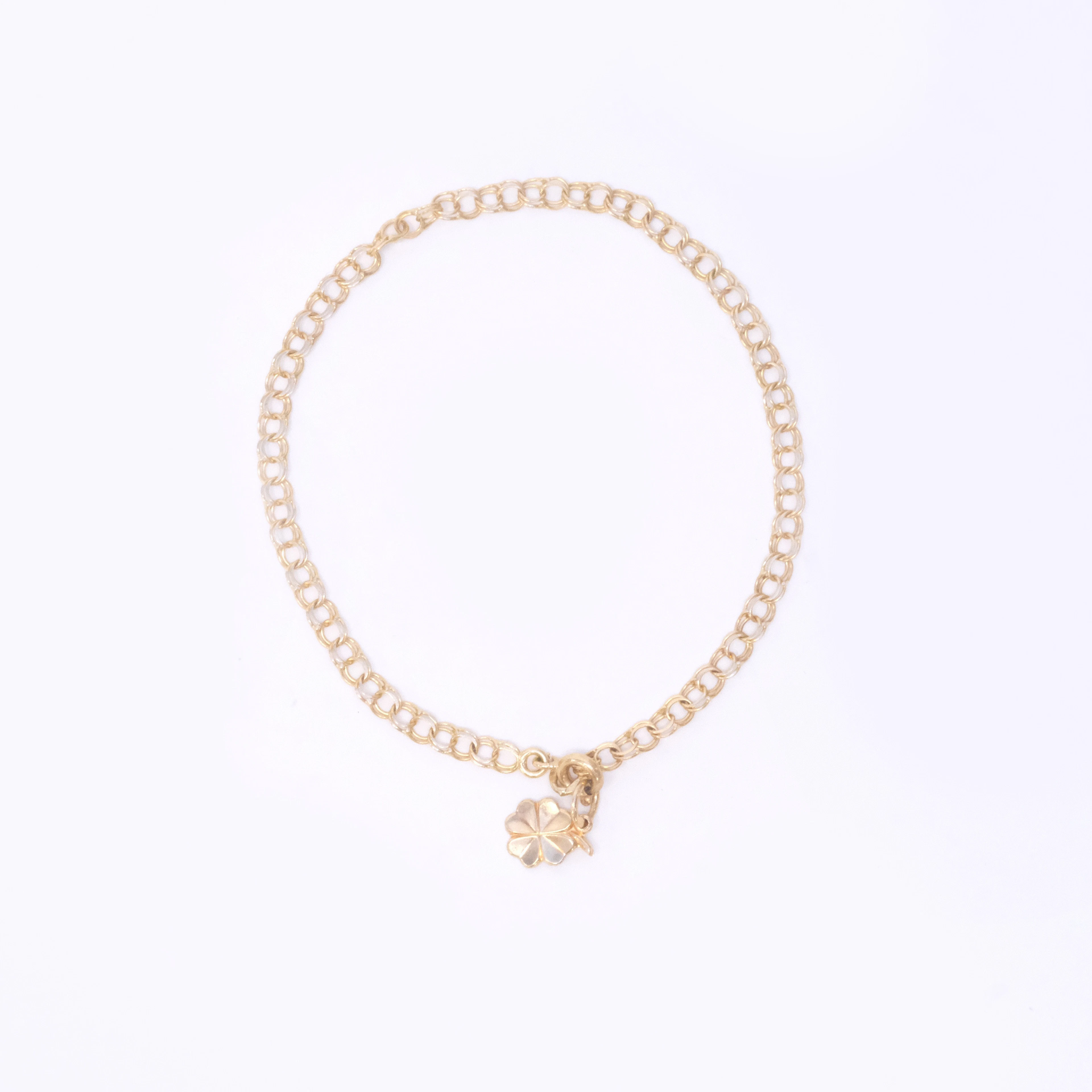 ARMBAND, BISMARCKLÄNK MED BERLOCK, 18K GULD.