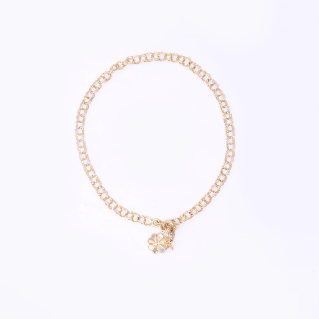 ARMBAND, BISMARCKLÄNK MED BERLOCK, 18K GULD.