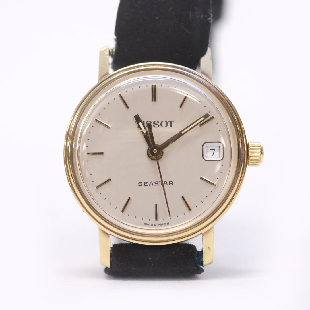 TISSOT DAMARMBANDSUR, 18 K GULD.