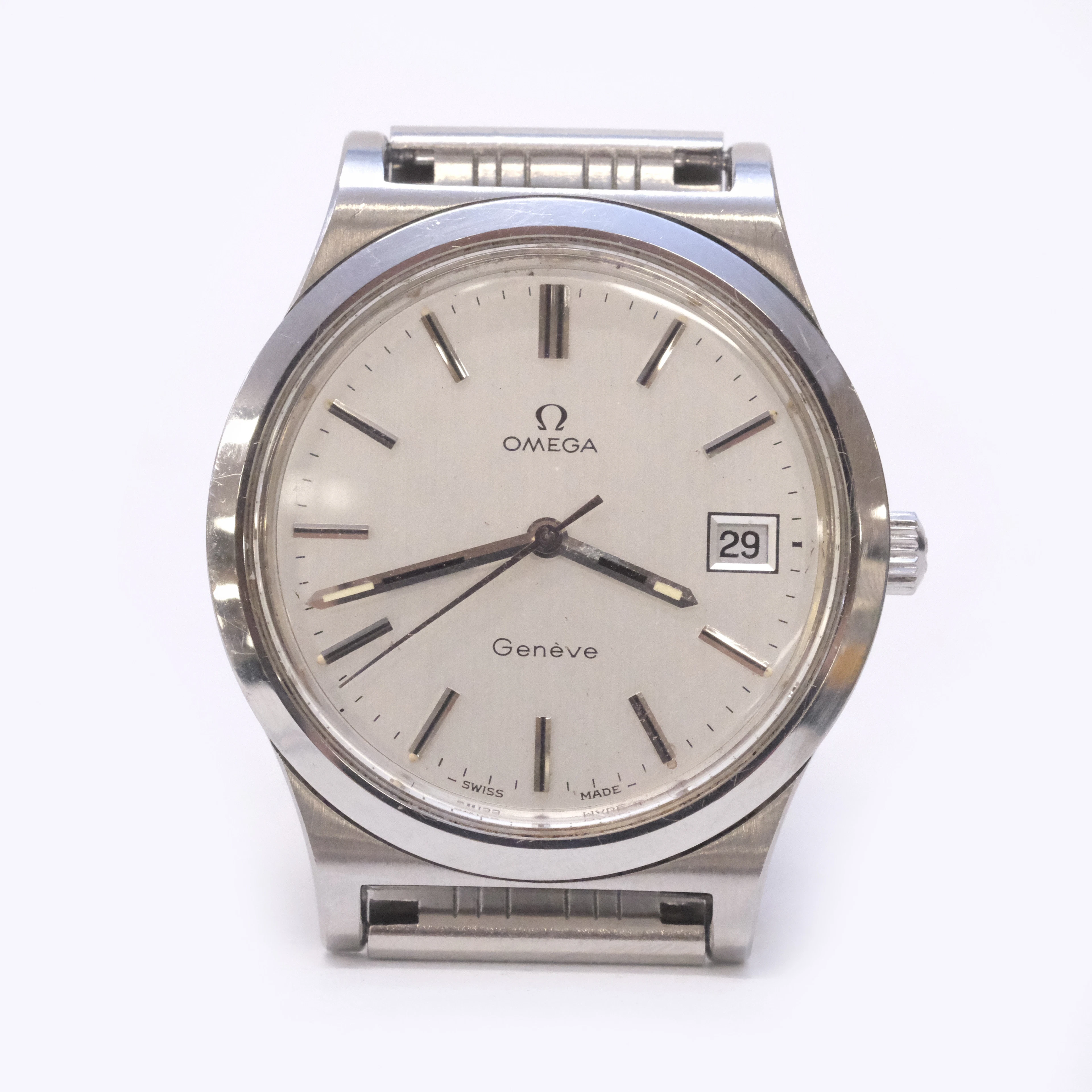 OMEGA. ARMBANDSUR. GENÉVE. STÅLBOETT. ÅR 1974.