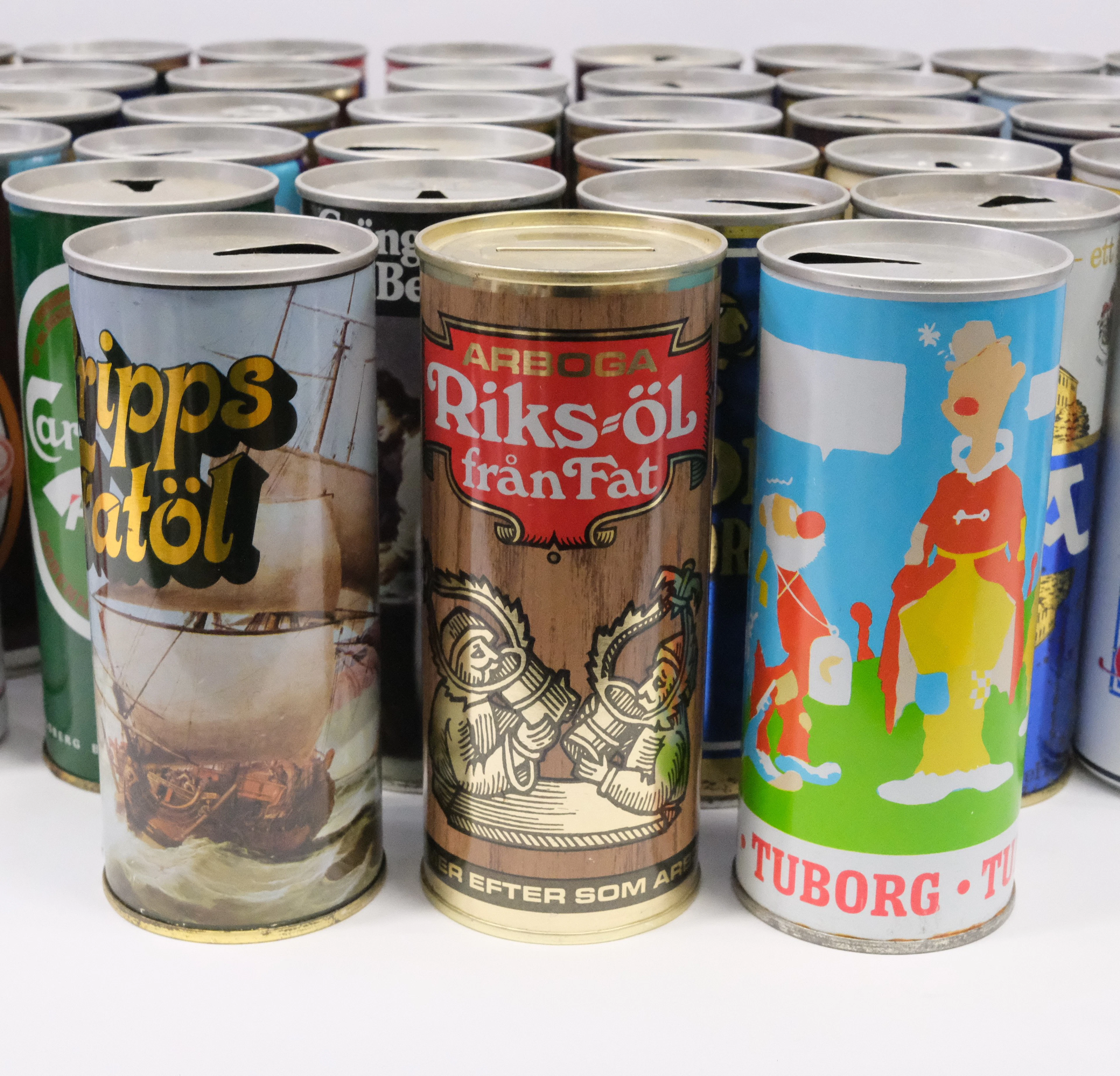 SAMLING ÖLBURKAR SAMT UNDERLÄGG, 1970-TAL.