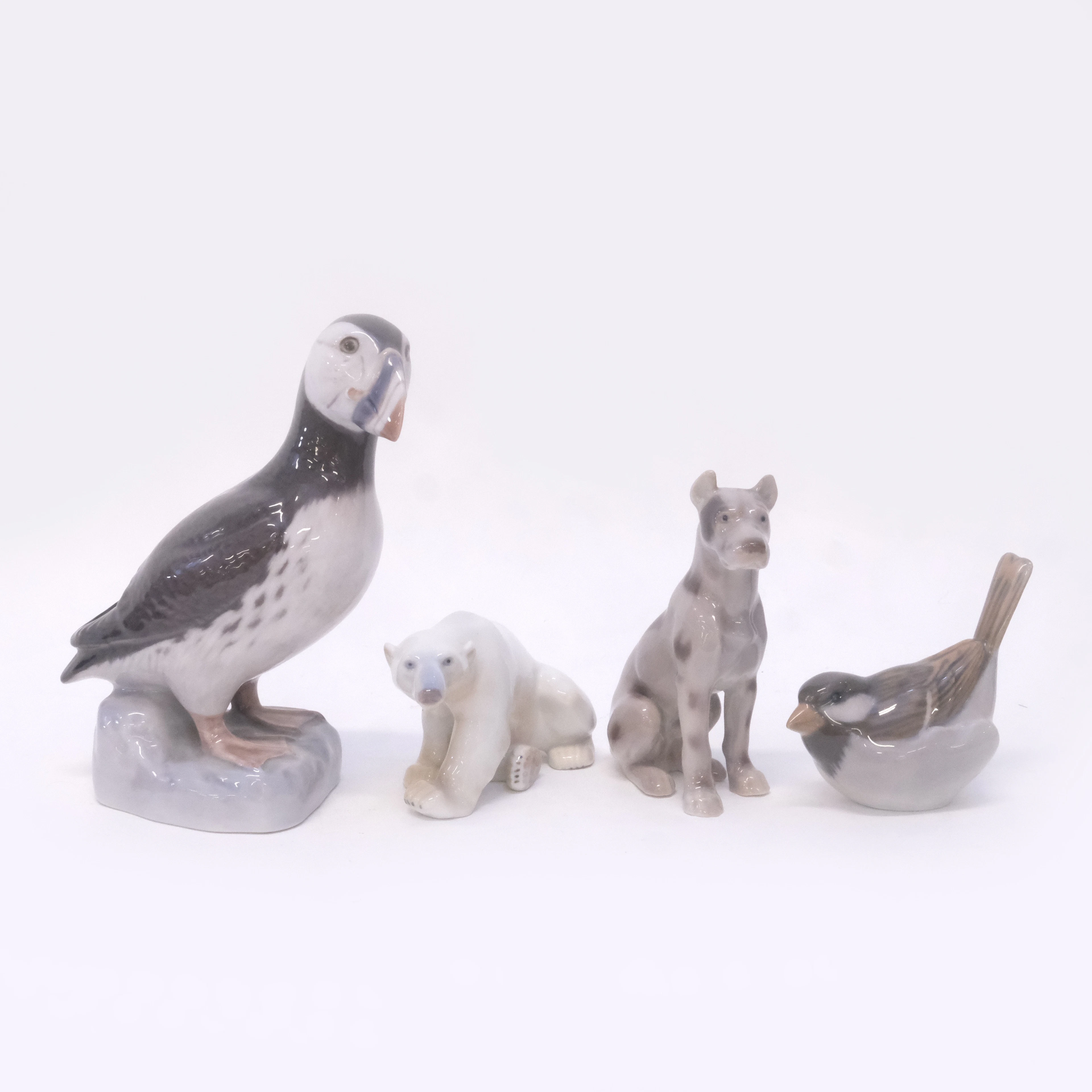 ROYAL COPENHAGEN / BING & GRÖNDAHL. FIGURINER, FYRA DELAR. FÅGLAR