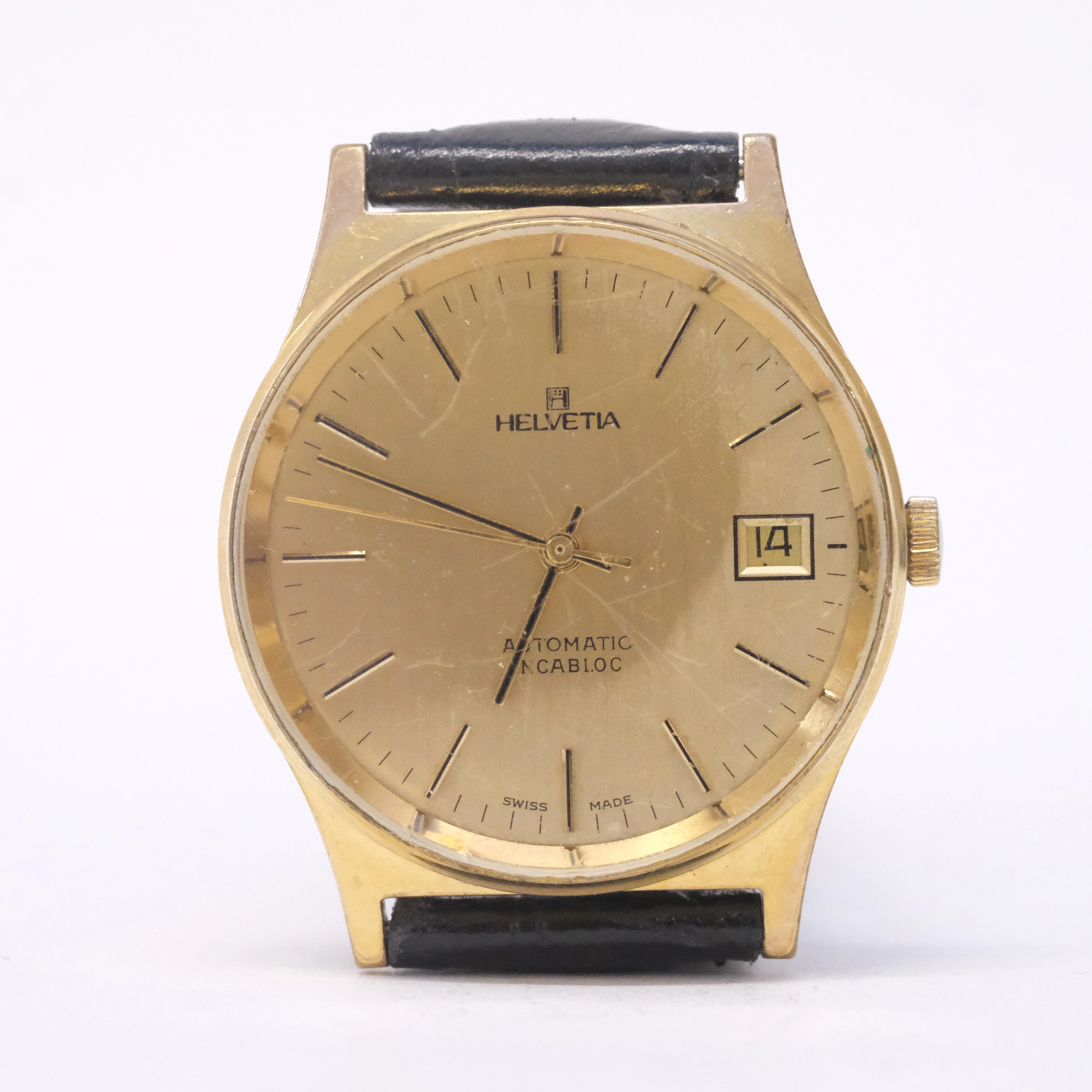 HELVETIA. ARMBANDSUR. AUTOMATIC. GULDDOUBLE.