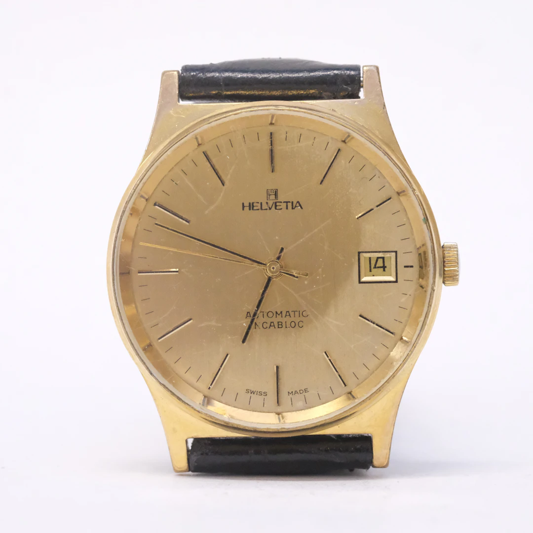 HELVETIA. ARMBANDSUR. AUTOMATIC. GULDDOUBLE.