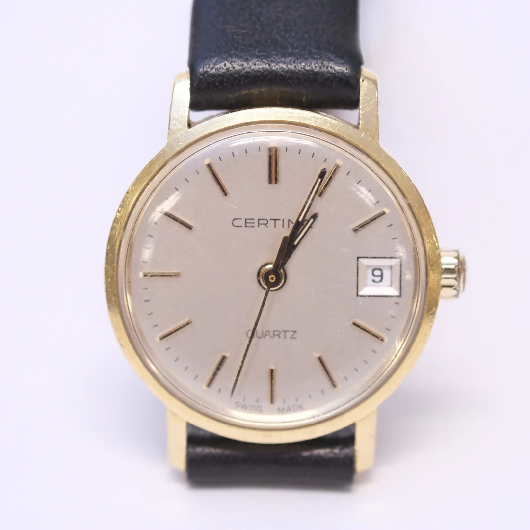 DAMARMBANDSUR, CERTINA, 18K GULD.