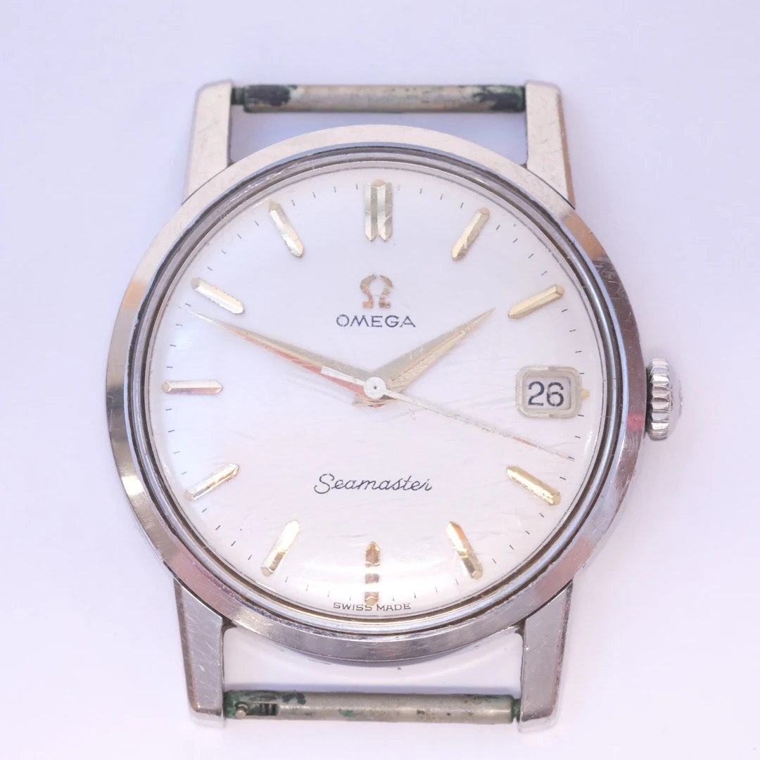 OMEGA. HERRARMBANDSUR, "SEAMASTER". ÅR 1963.