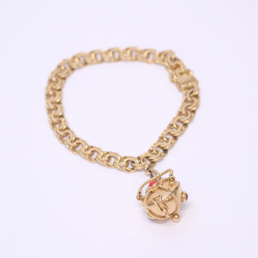 ARMBAND, BISMARCKLÄNK MED BERLOCK, 18K GULD.