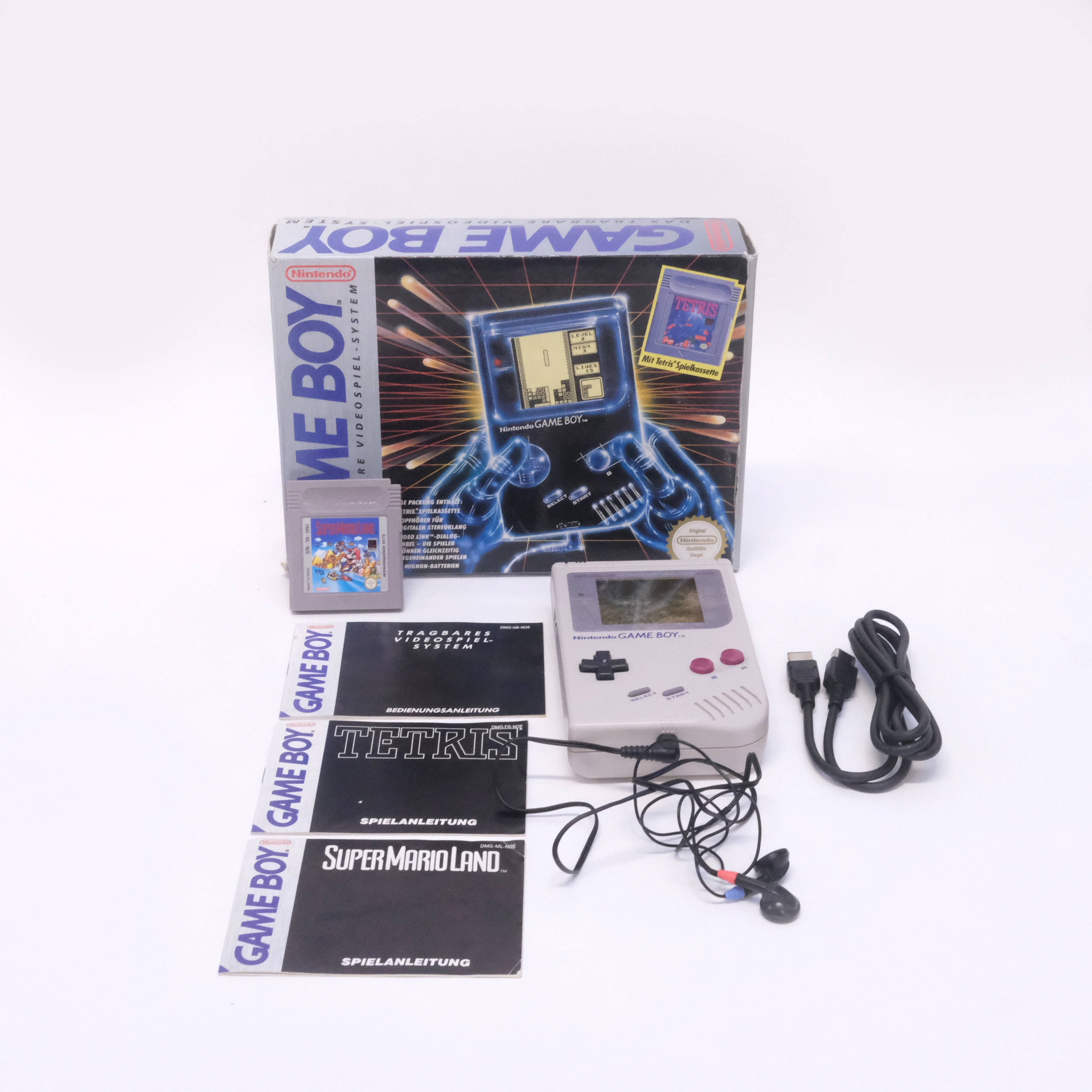 INTENDO. HANDKONSOL "GAME BOY". 1989. MED SPELKASSETT, "SUPER MARIO LAND".