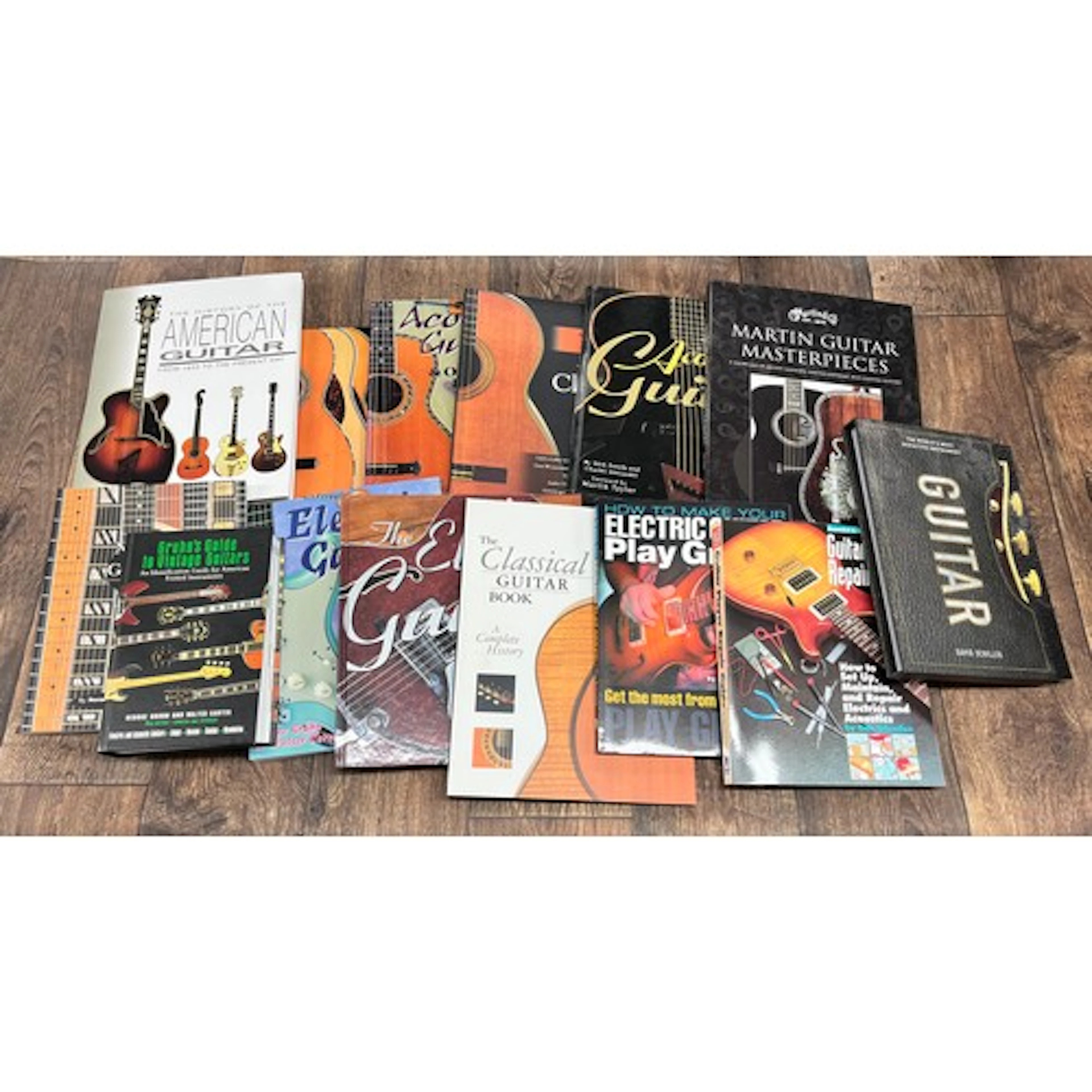 Fourteen various guitar reference books, to include Schiller...