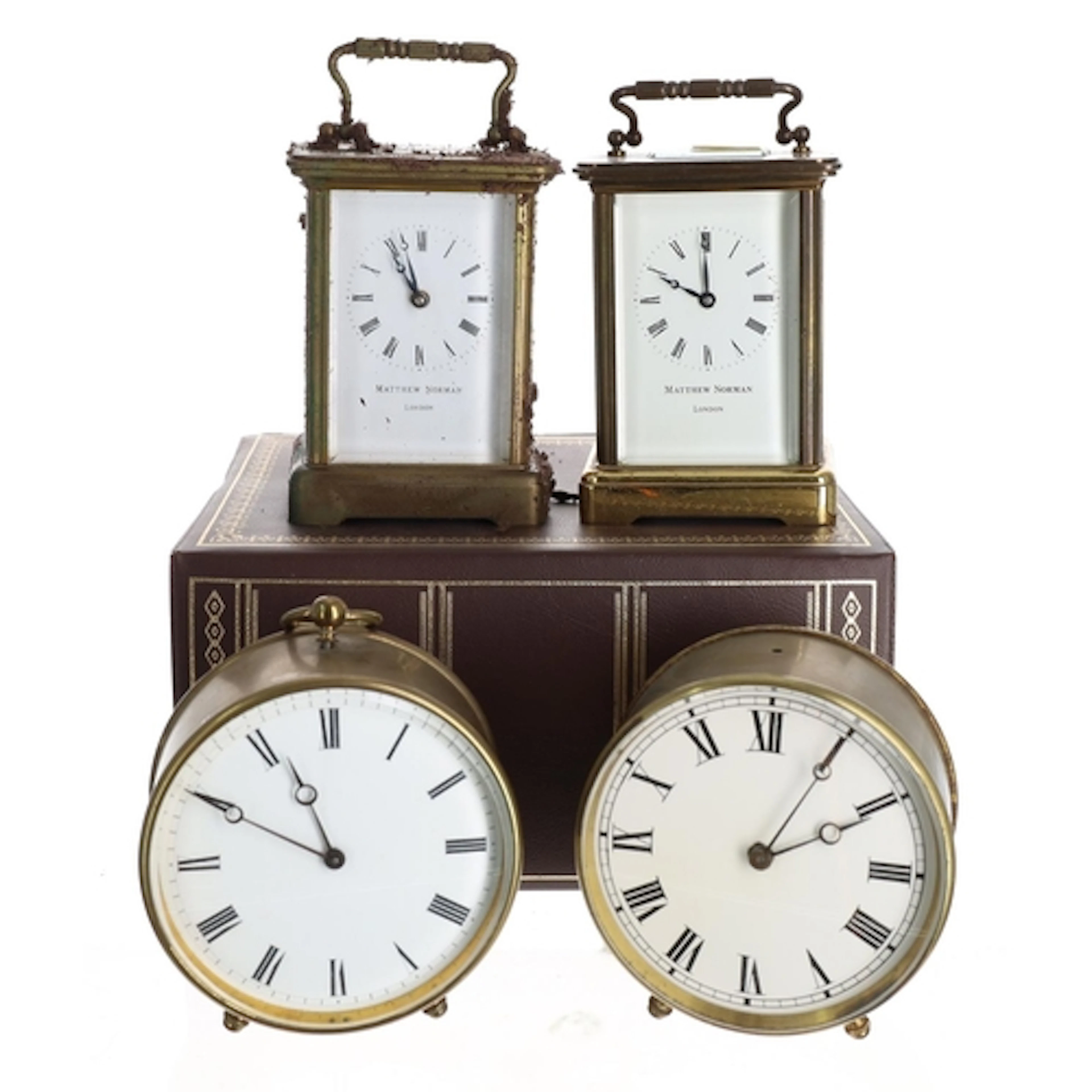 Two Matthew Norman carriage clock timepieces, each with leve...