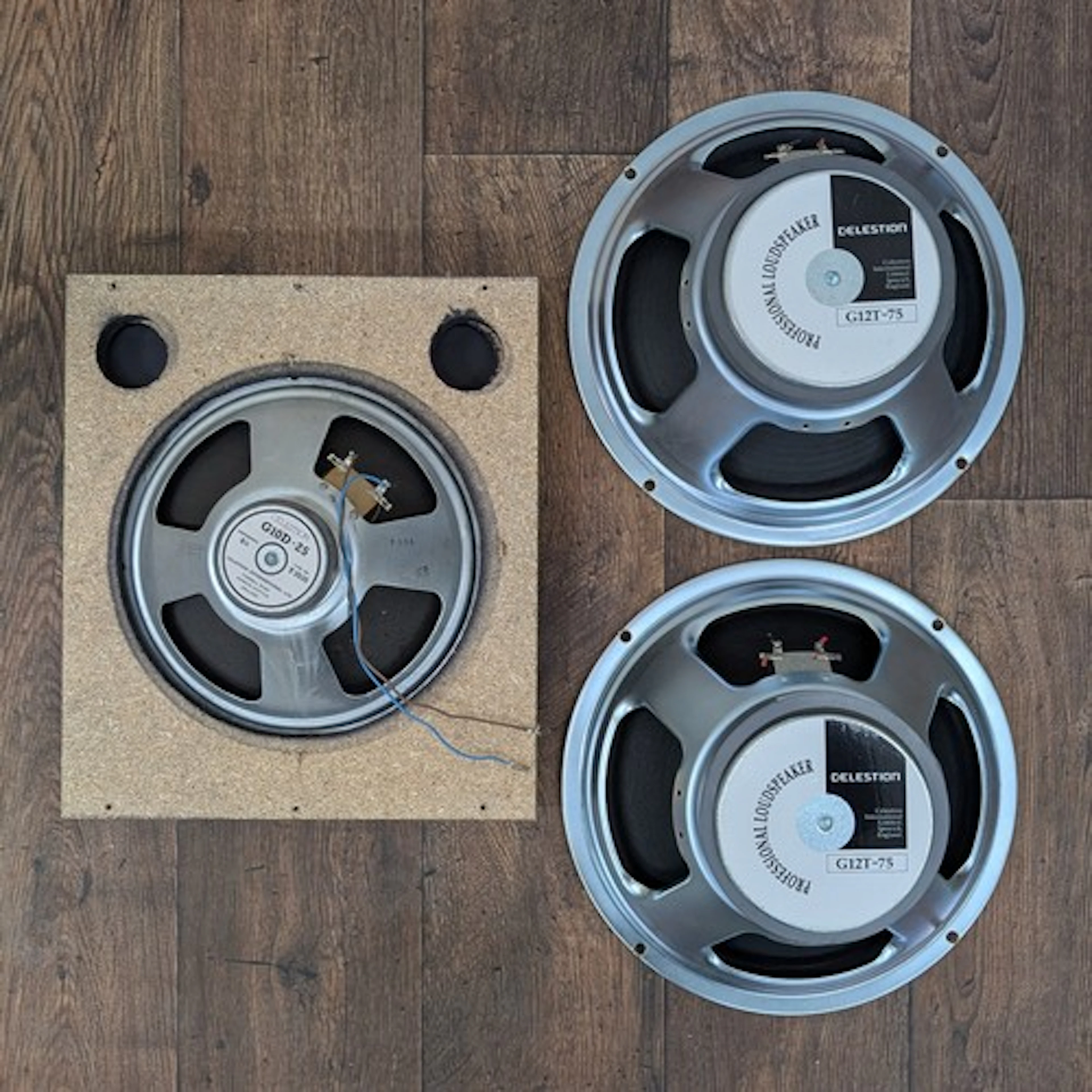 Three Celestion speakers, to include a pair of 2003 G12T-75 ...
