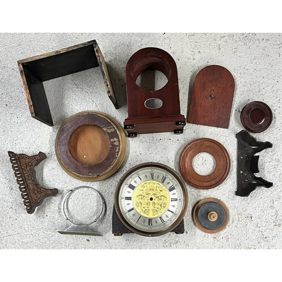 Selection of wood and metal clock cases and stands ** From ...