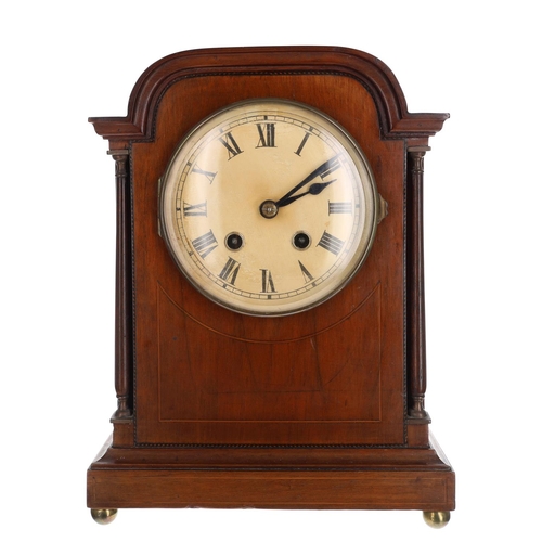 German mahogany two train mantel clock, 4.75'' Roman numeral...