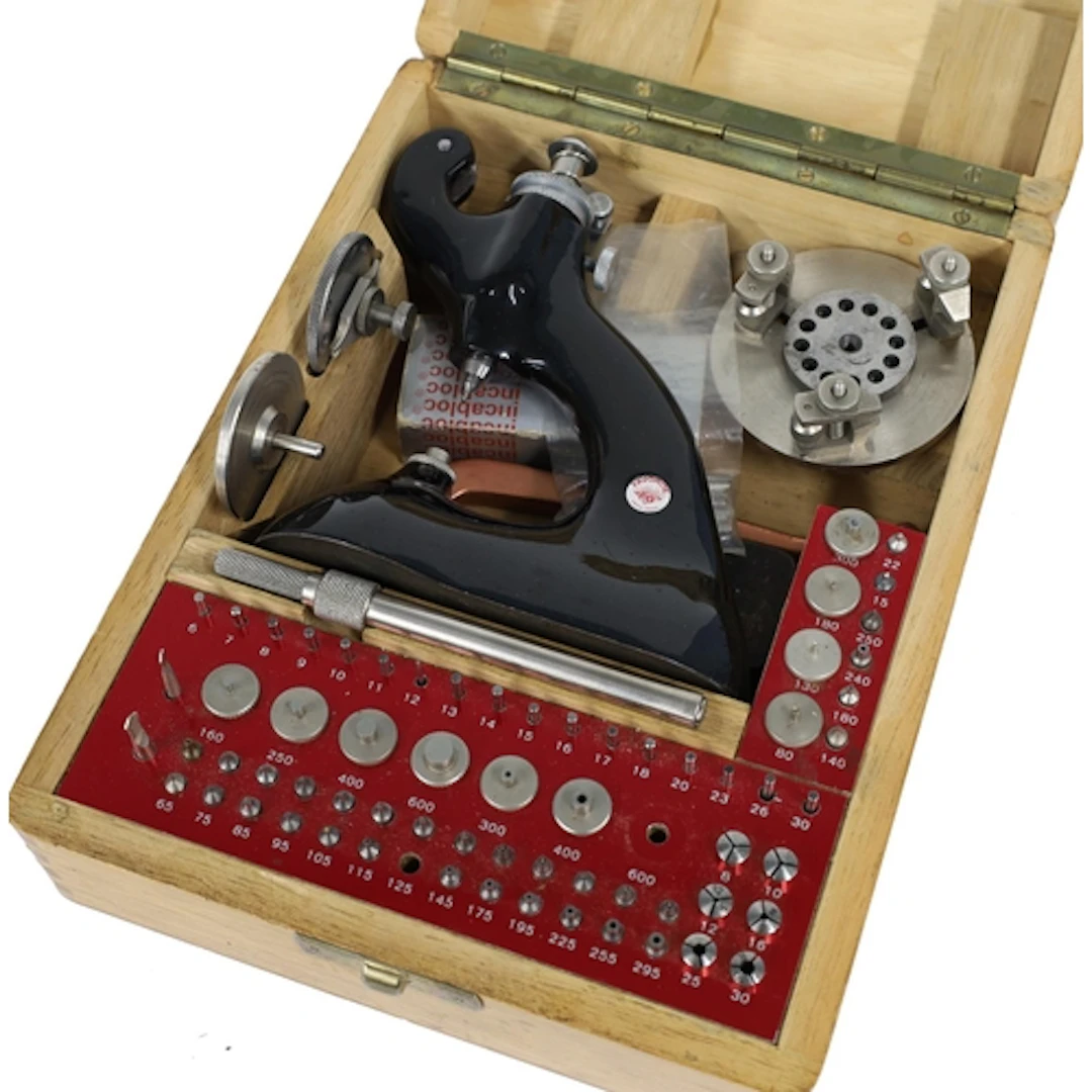 Favorite staking tool with accessories, within original wood...