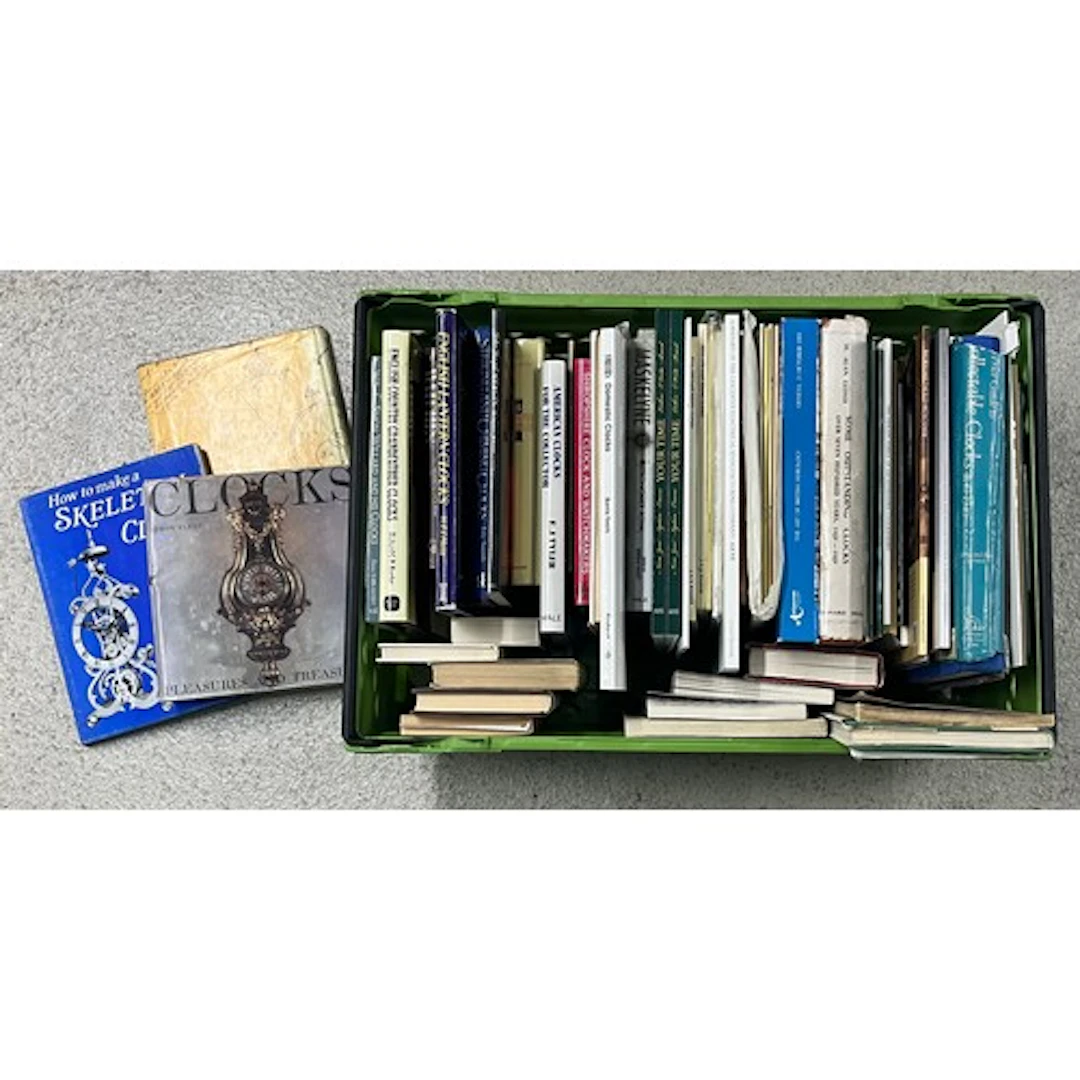 Quantity of horology related reference books to include E.J....