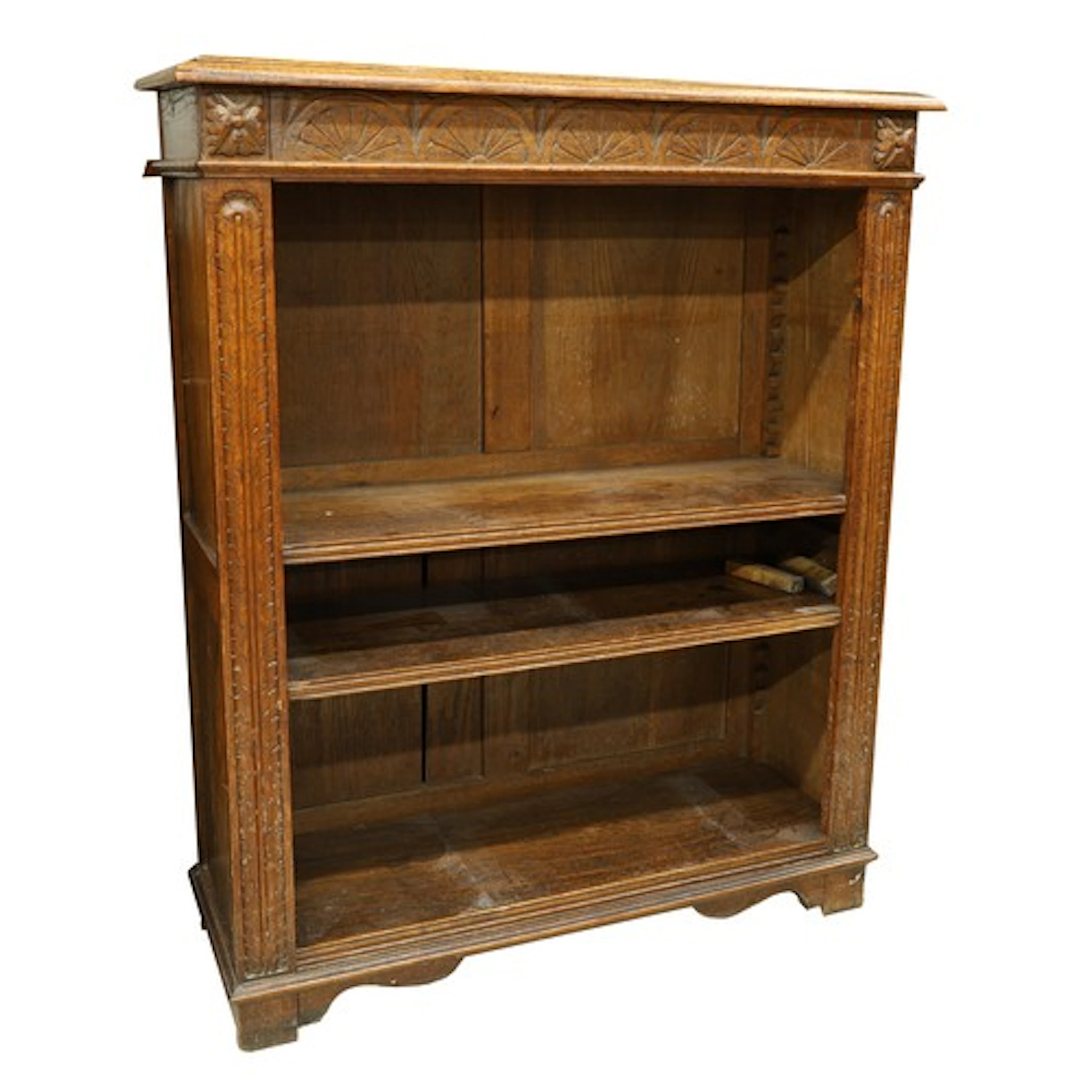 Carved oak open bookacse, fitted with adjustable shelves, on...