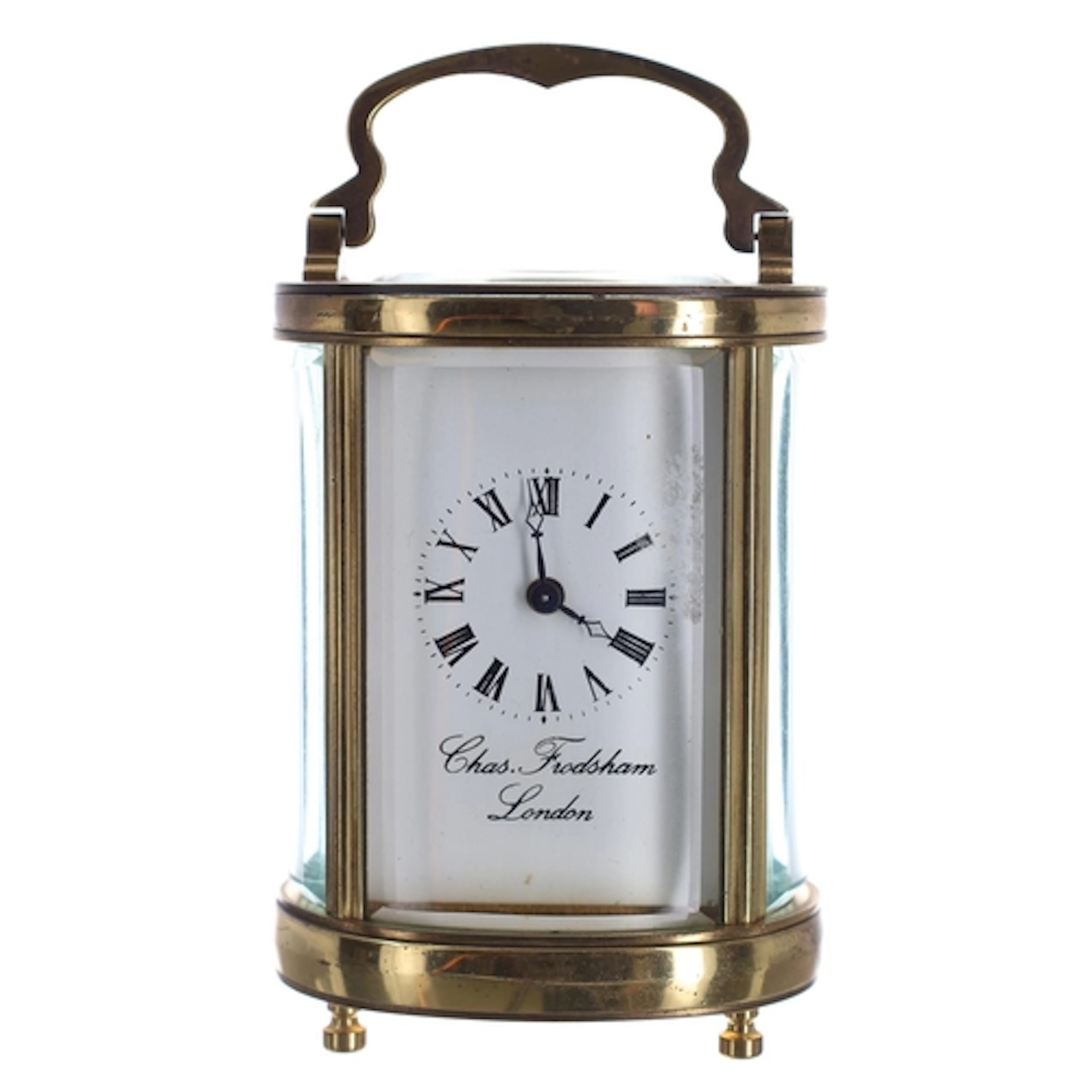 Miniature oval brass carriage clock timepiece, the Roman num...