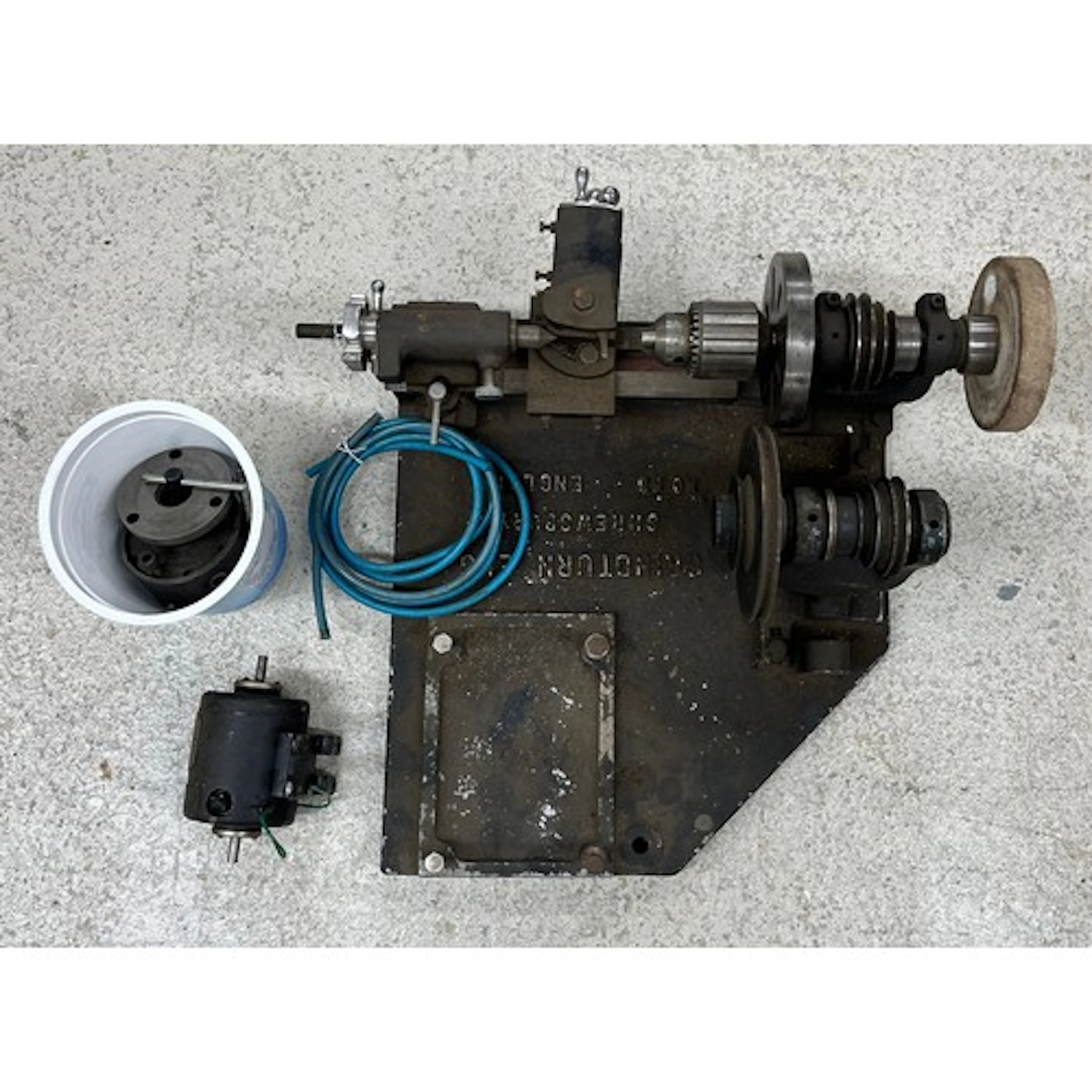 Small clockmakers lathe on a heavy base plate...