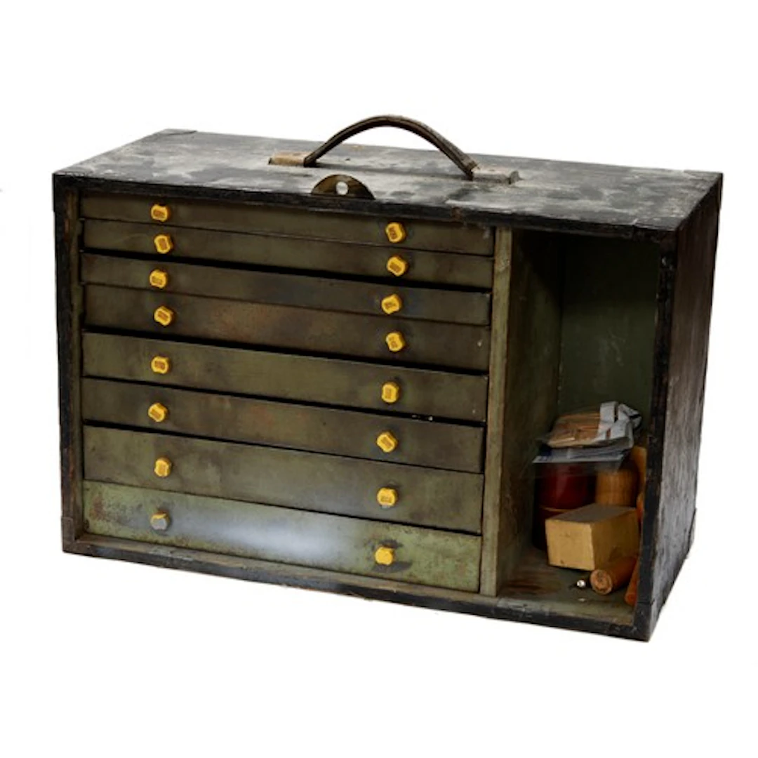 Wooden watchmakers tool chest with eight metal drawers conta...