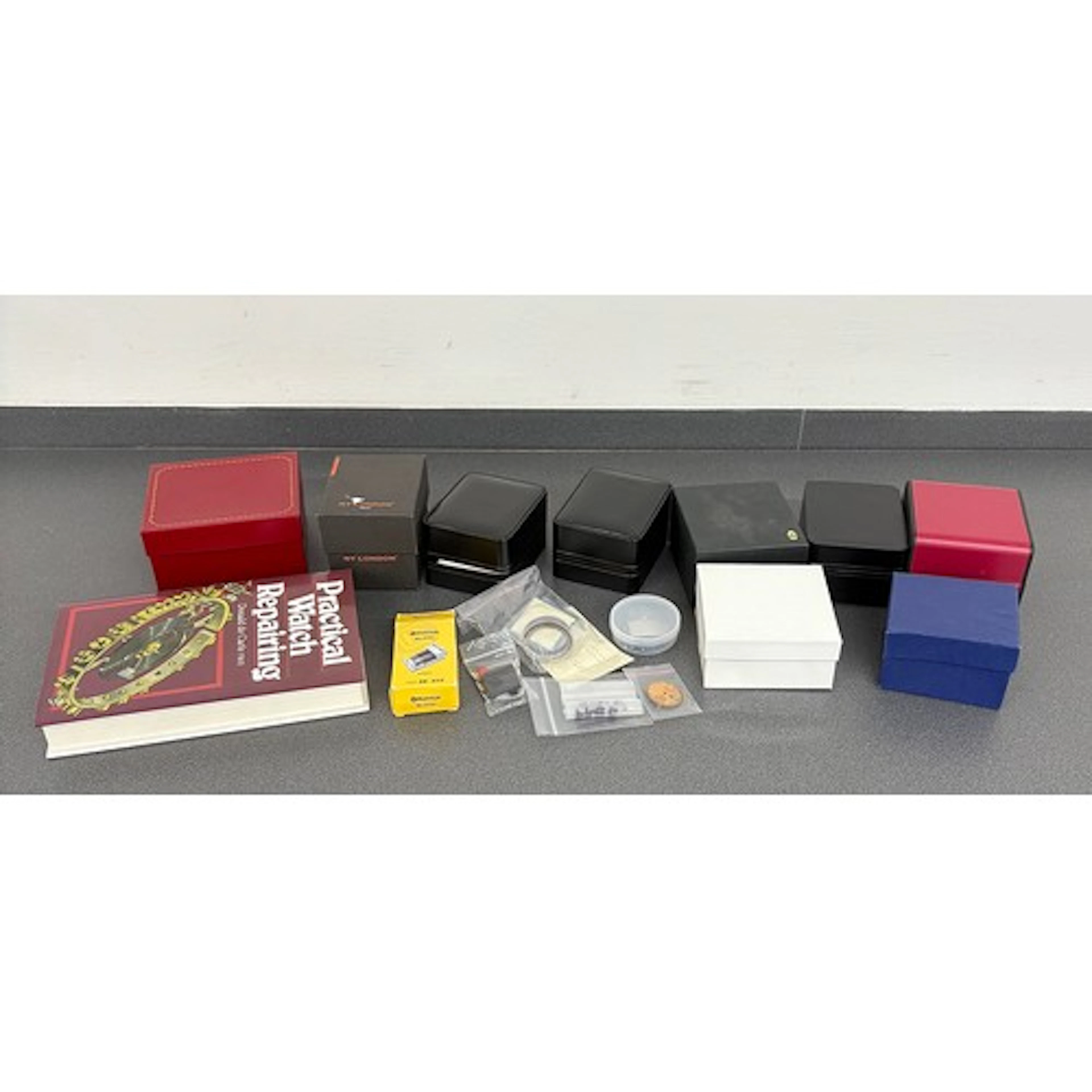 Wristwatch strap pin bar tool, with box; together with a qua...