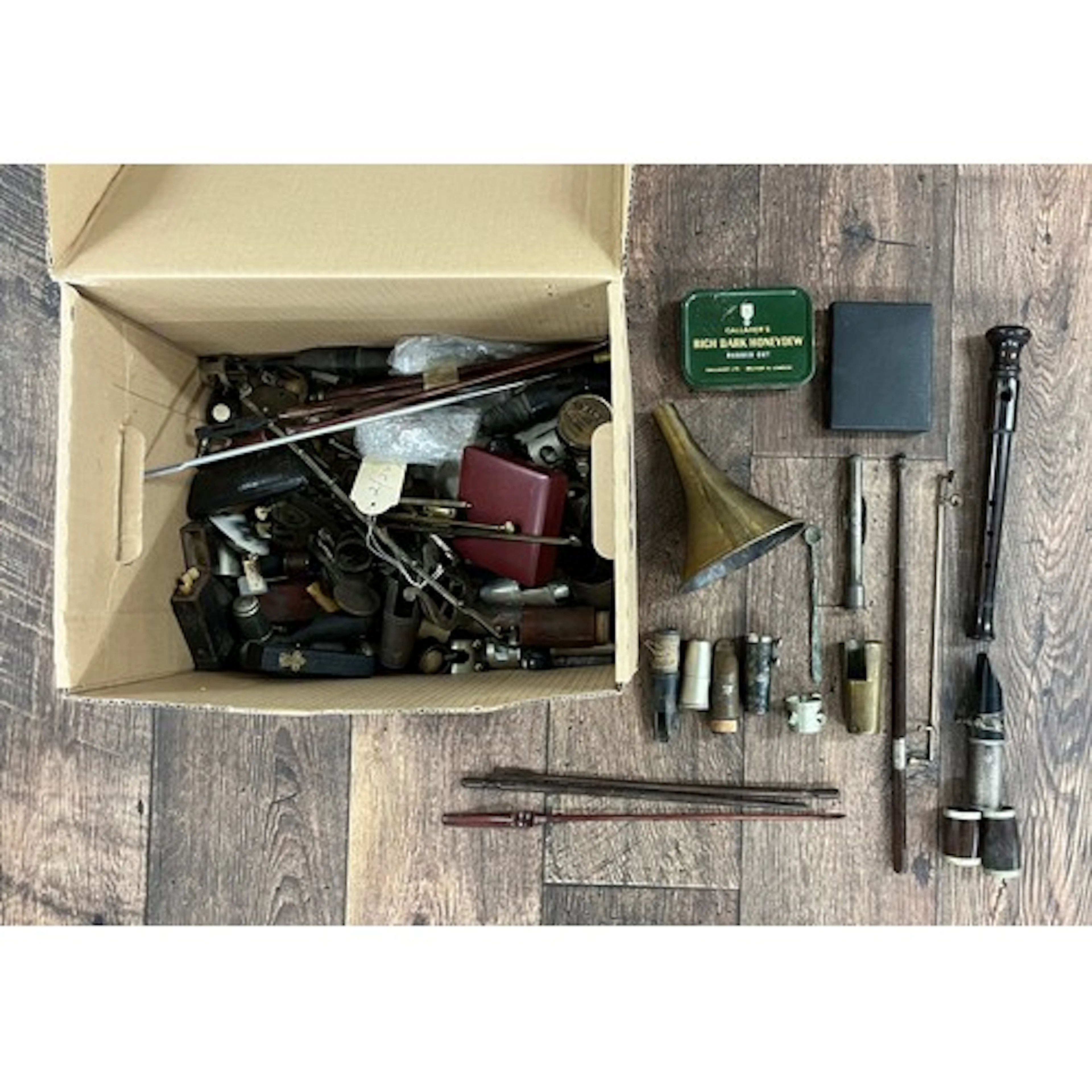 Box of various clarinet mouthpieces, ligatures and barrels; ...