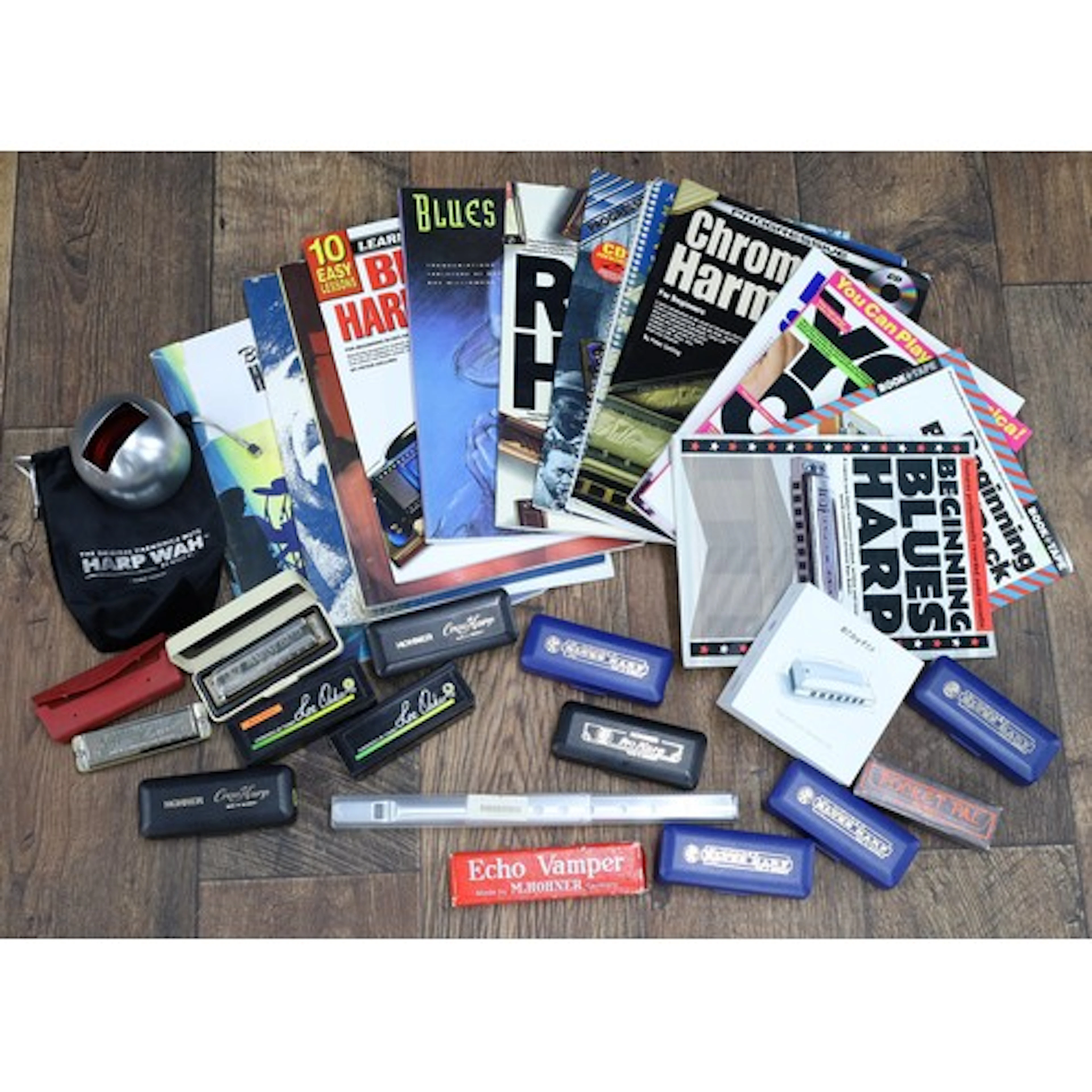 Assorted blues mouth organs; M. Hohner Blues Harps in D, E a...