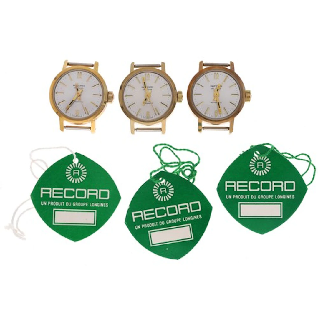 Three Record De Luxe automatic gold plated and stainless ste...