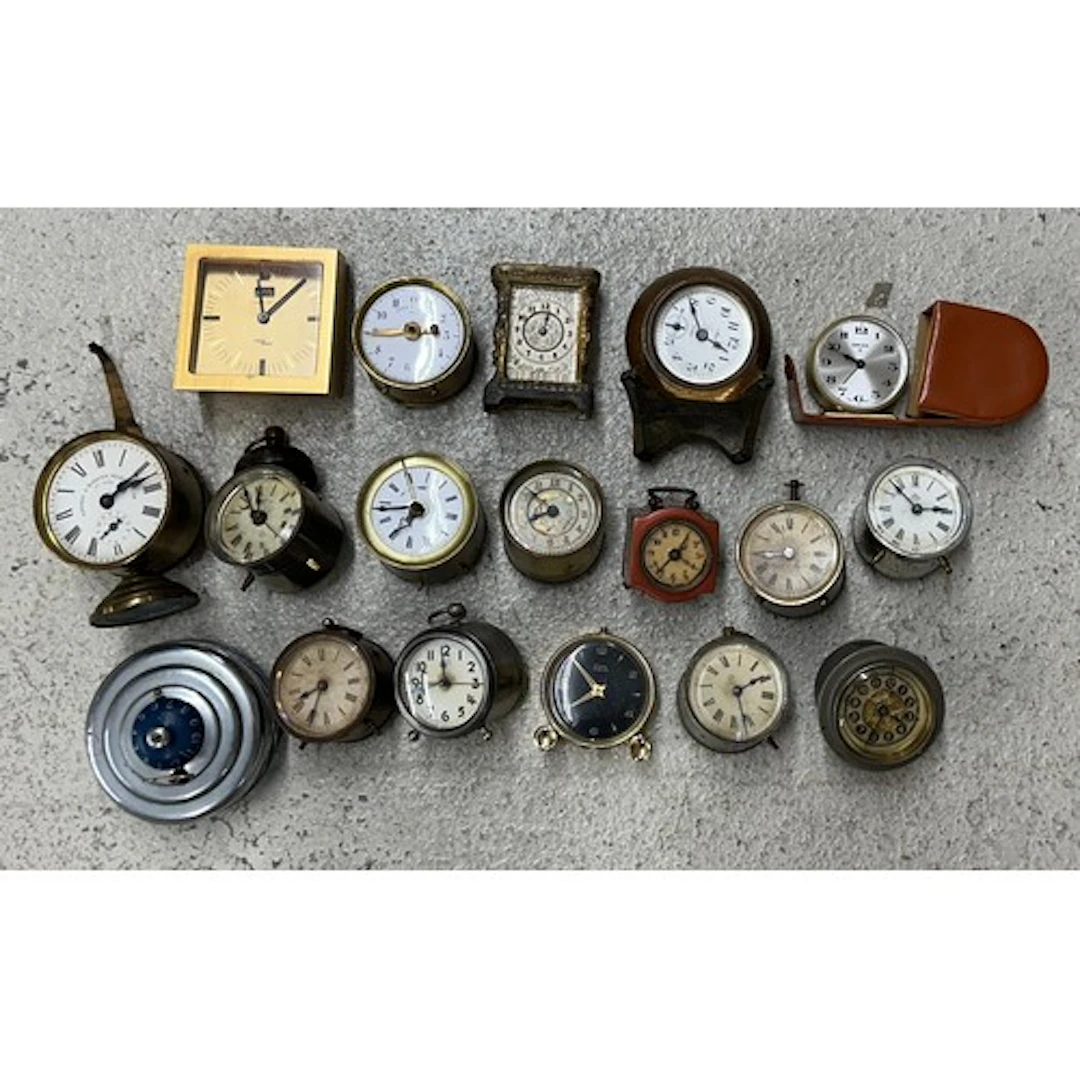 Selection of assorted travel and cabinets clocks ** From th...