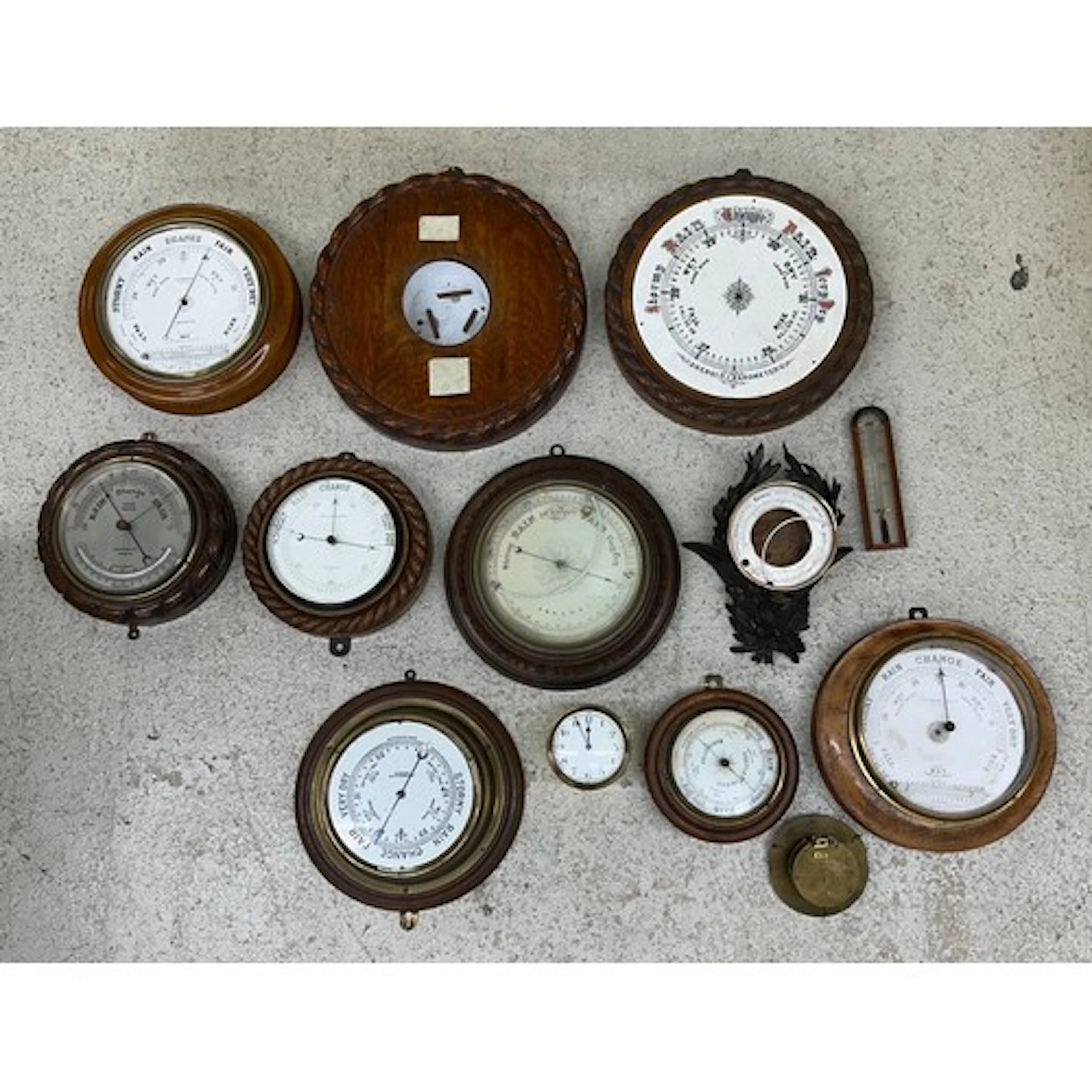 Collection of carved oak rope twist wall barometers, baromet...