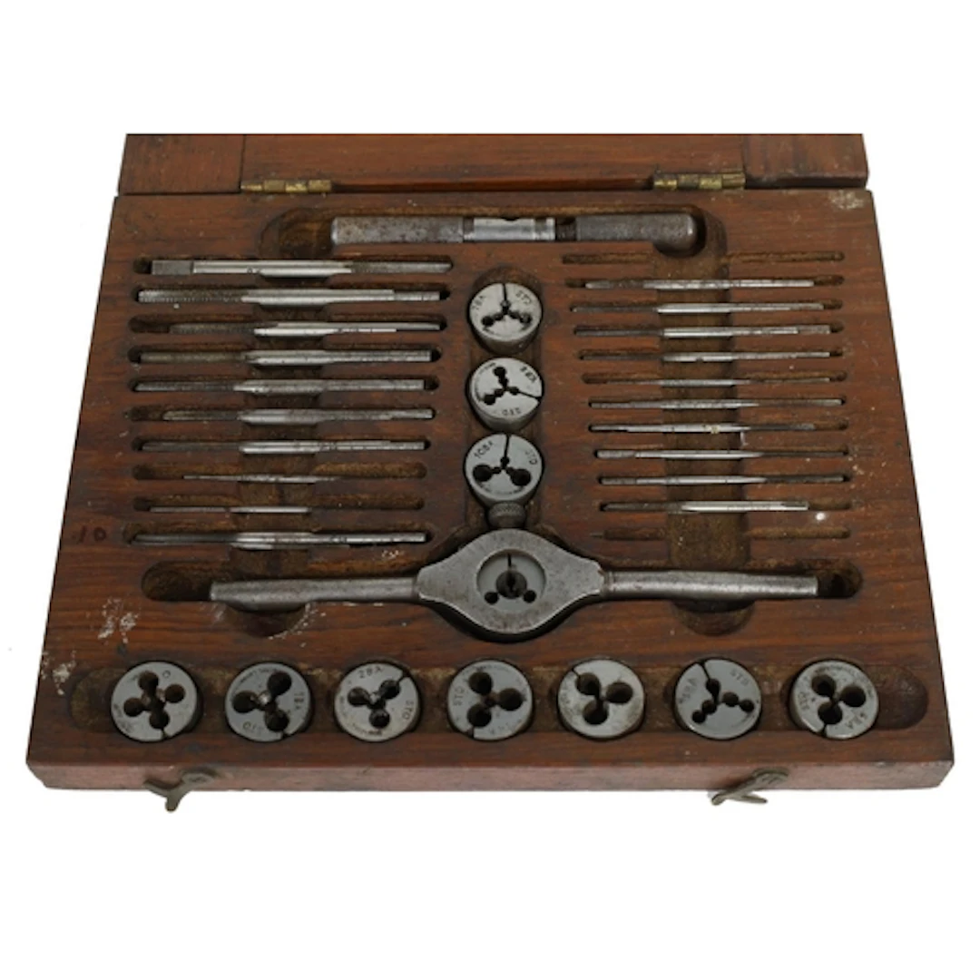 Tap and die set stamped STD Original London Make, within a w...