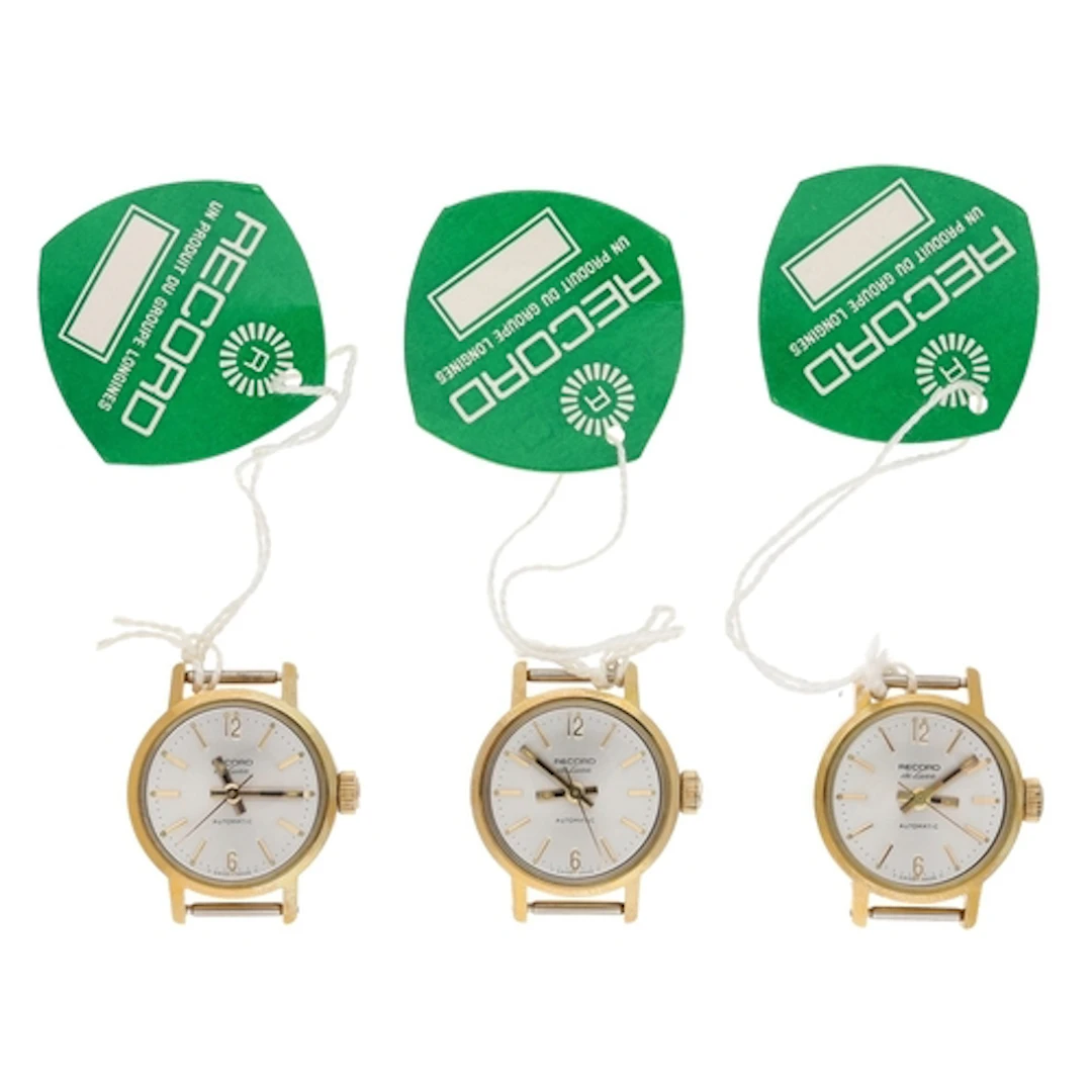 Three Record De Luxe automatic gold plated and stainless ste...