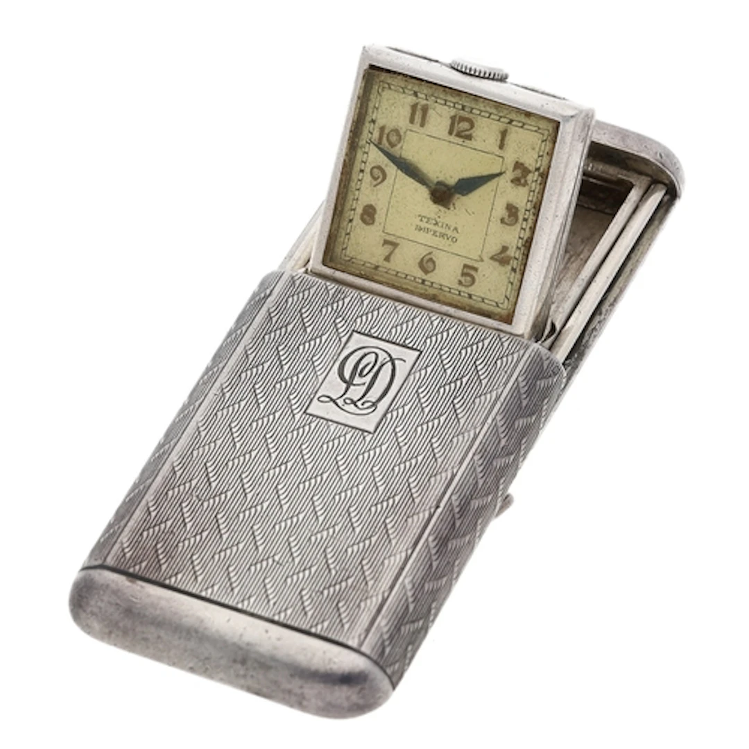 Silver engine turned purse watch, import hallmarks London 19...
