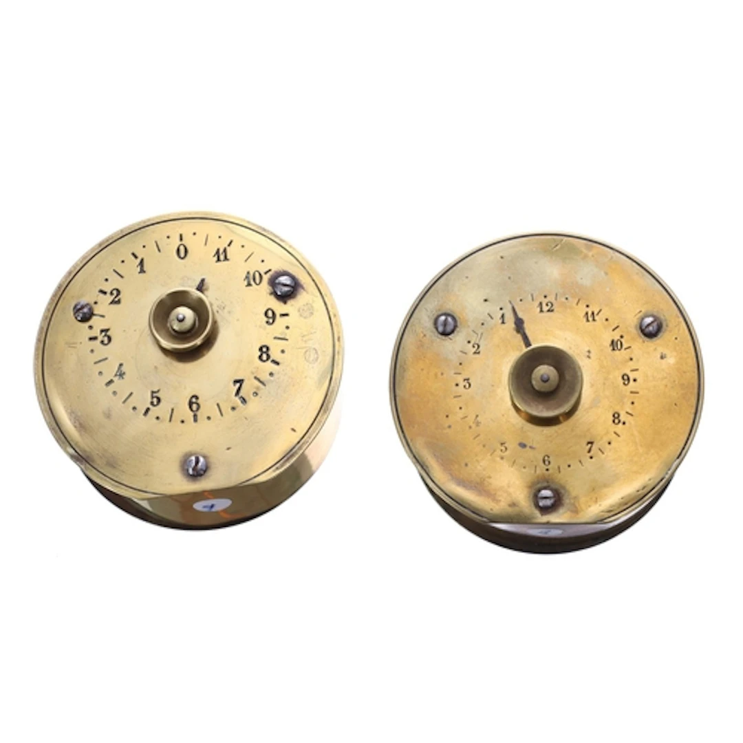 Two similar French 19th century Patent alarm brass drum trav...