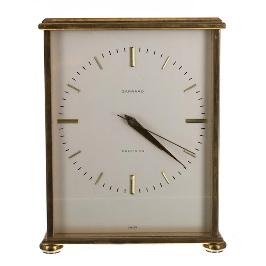 Garrard Precision brass electric mantel clock, the signed si...
