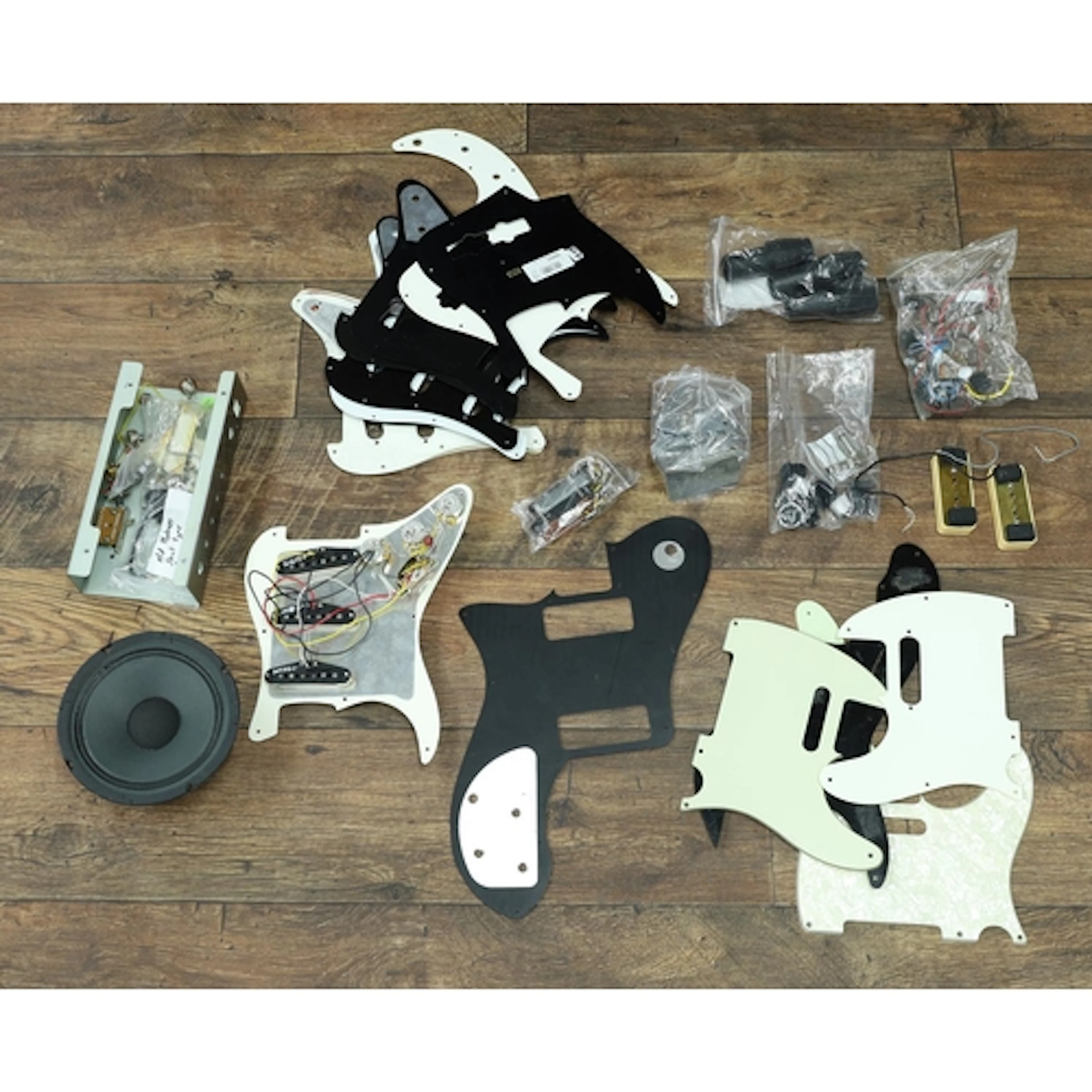 Selection of guitar spares and other items to include a Fend...