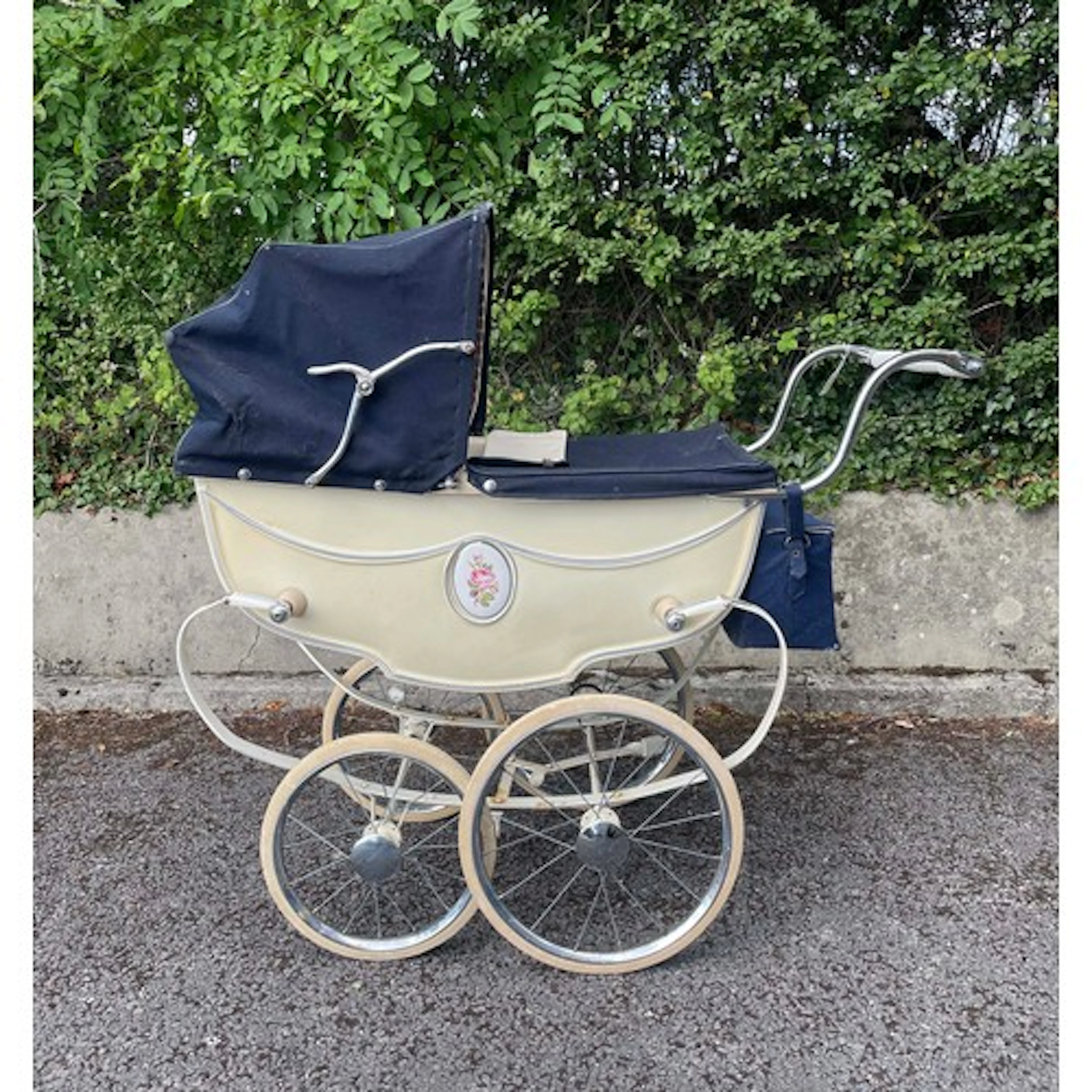 Silver Cross 'Rose' model doll's pram, 1959, cream with a ce...