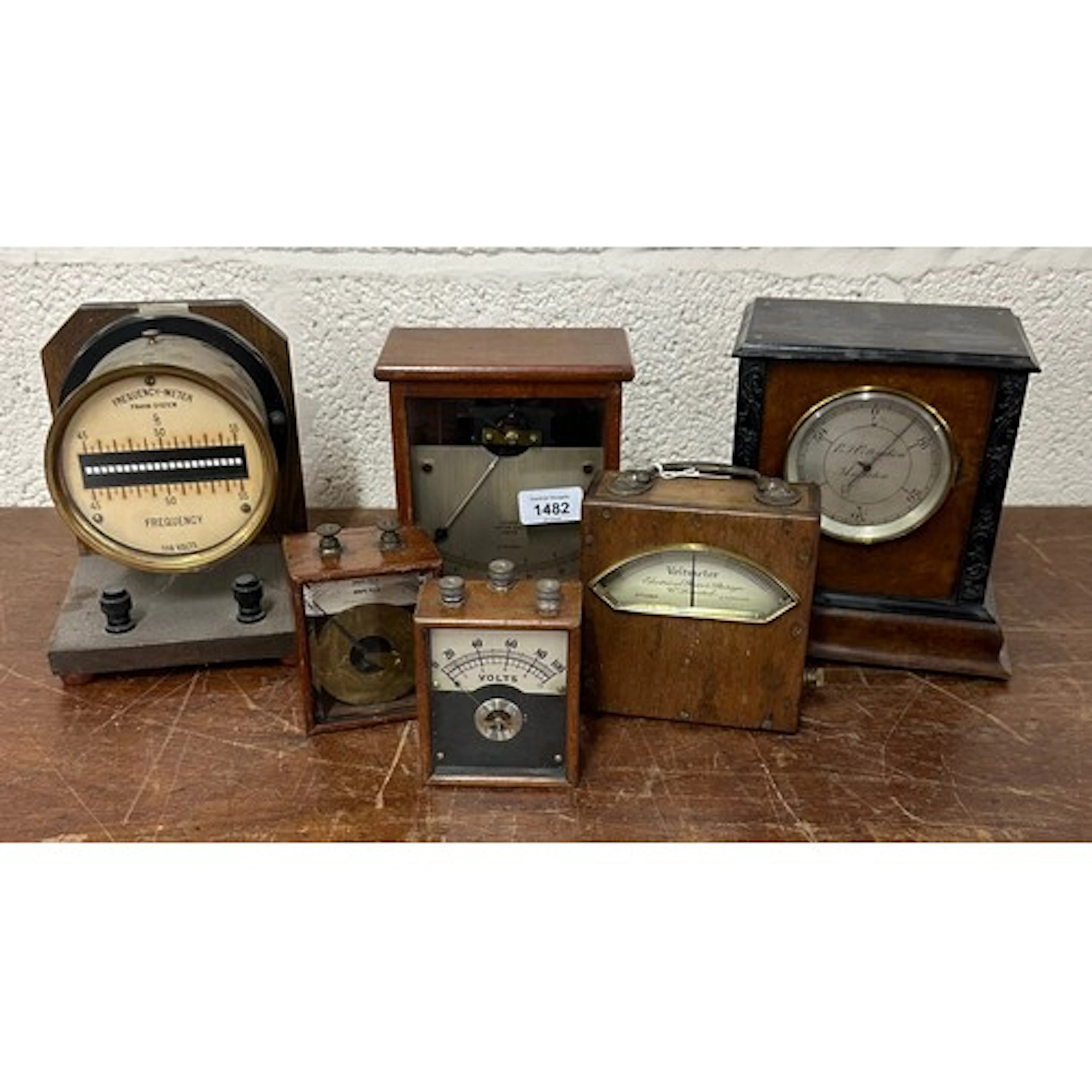 Interesting electric mantel timepiece in walnut case, the mi...