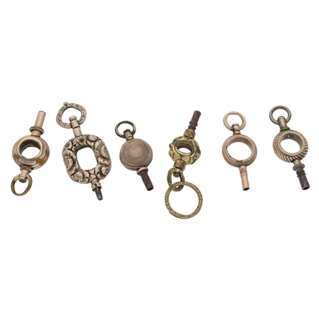 Six assorted pocket watch keys (6)