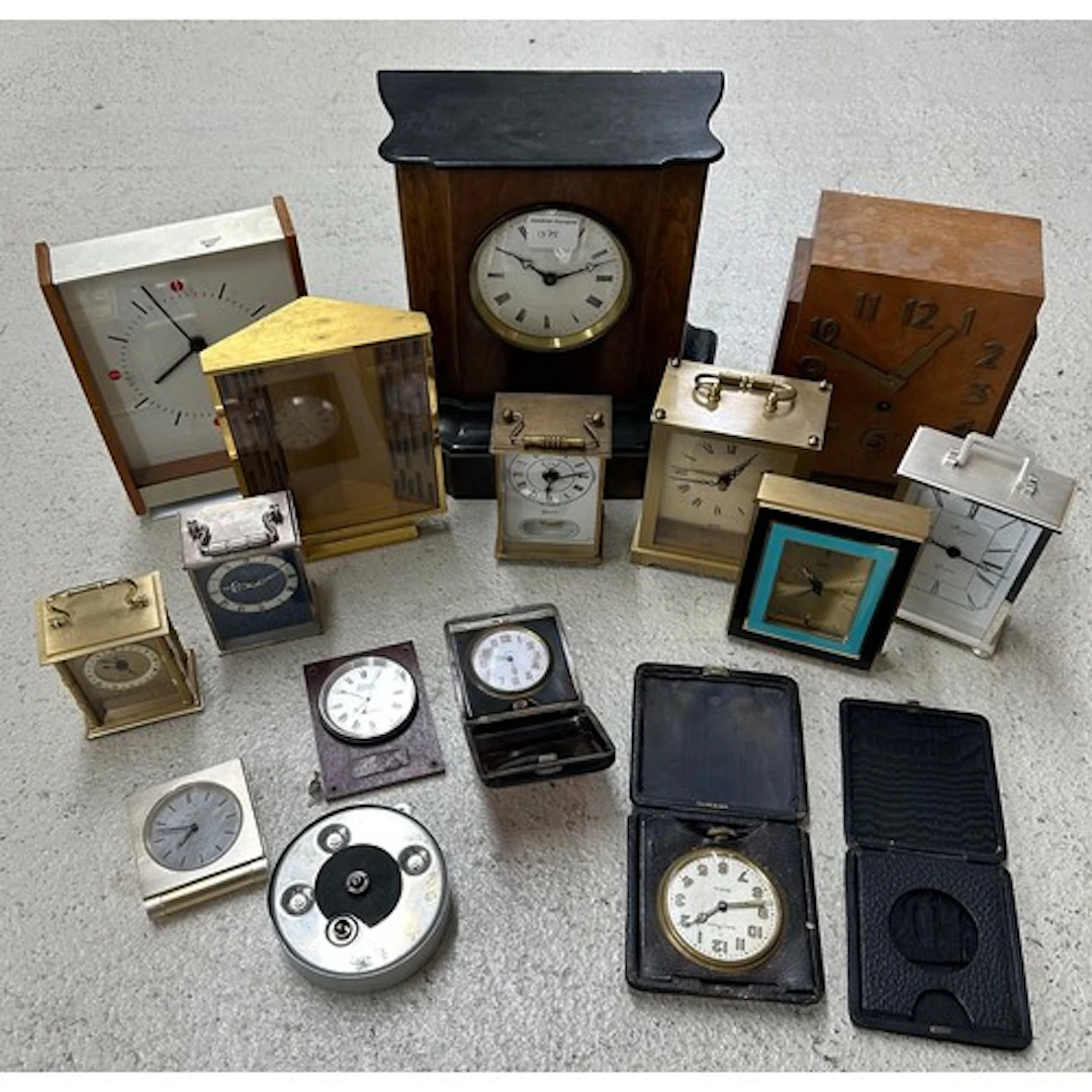 Walnut mantel clock together with a selection of carriage cl...