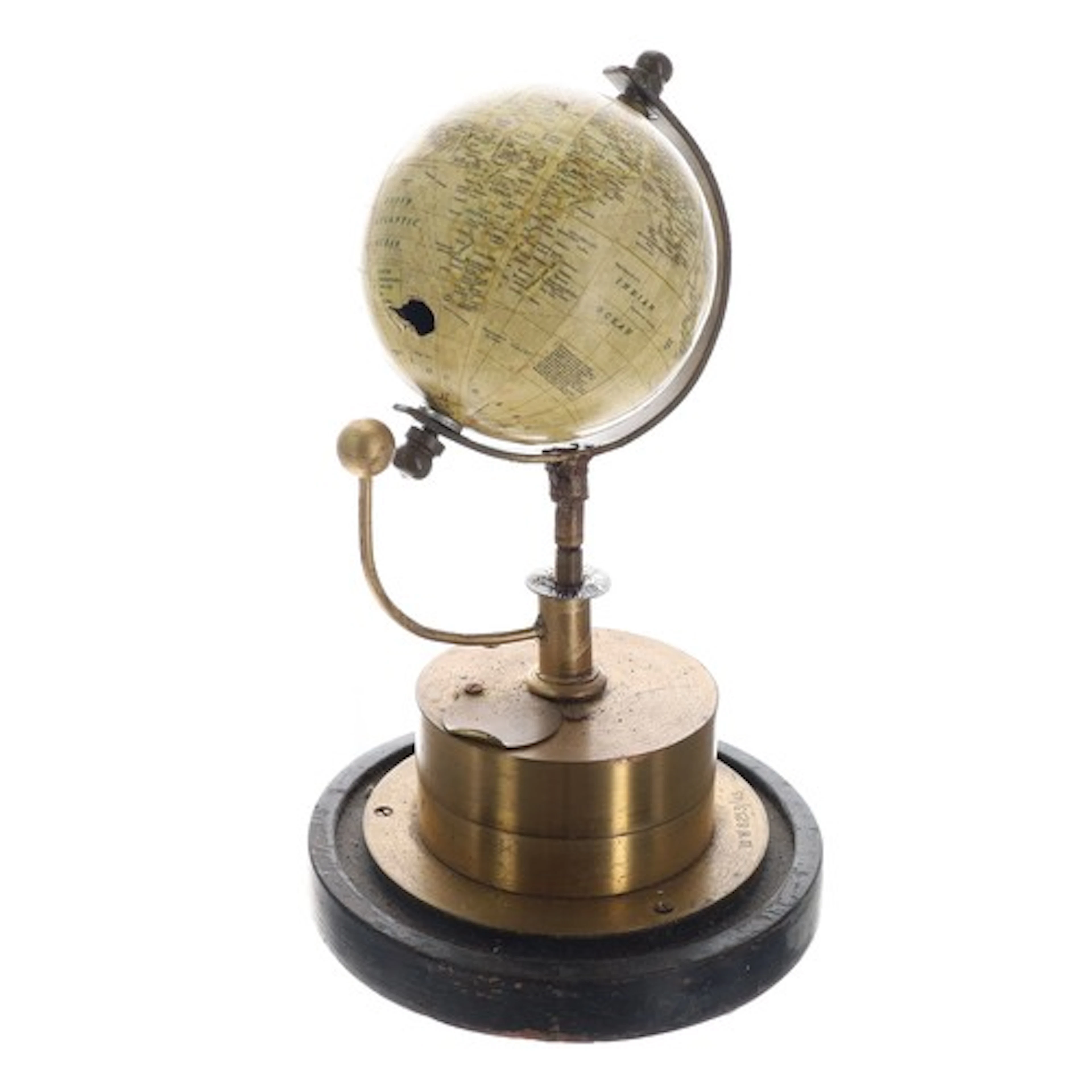 Brass rotating terrestial globe timepiece, on gilt brass dru...