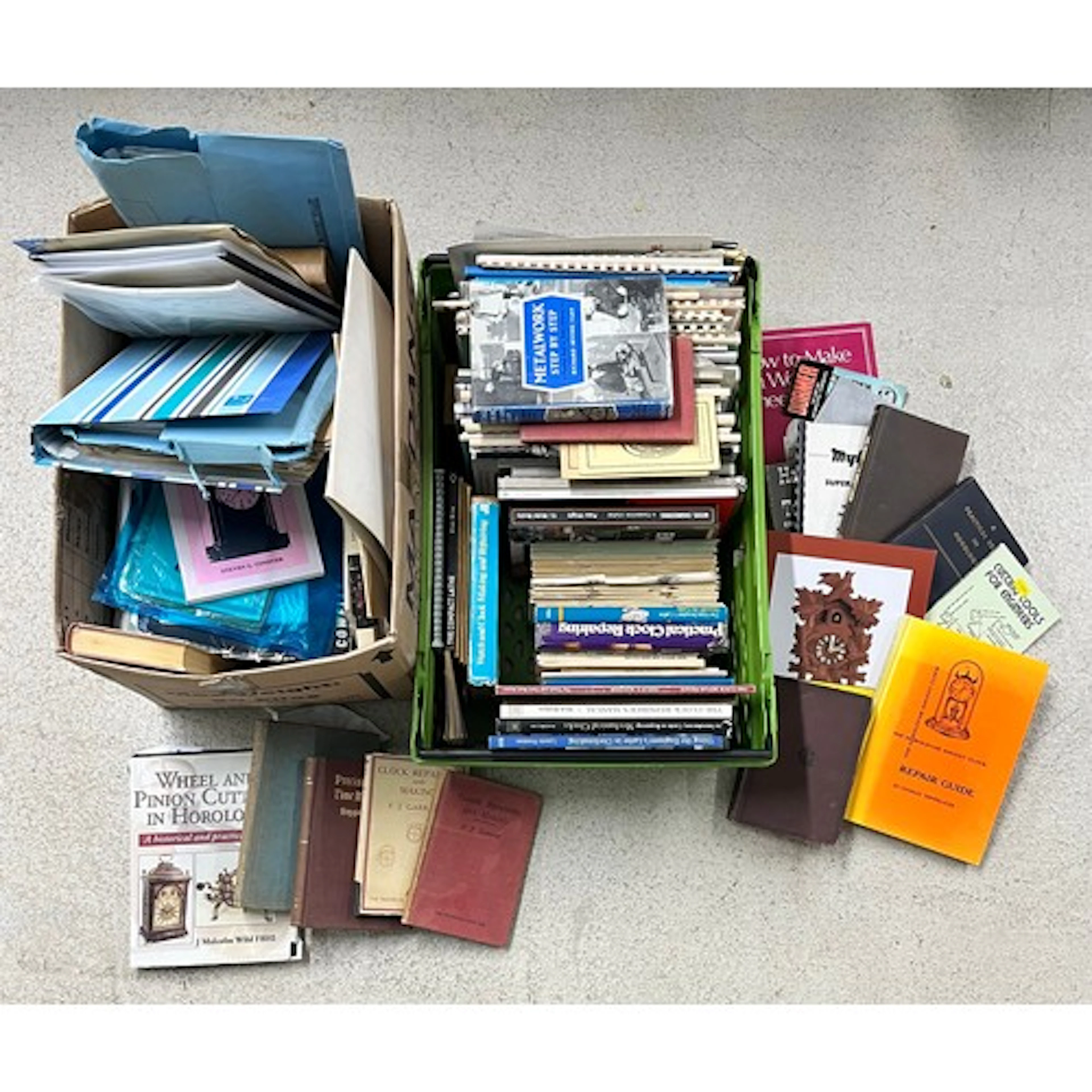 Two boxes containing a large quantity of books relating to c...