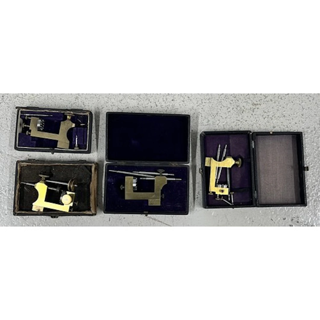 Four cased brass and steel watchmakers pivot tools (4)...