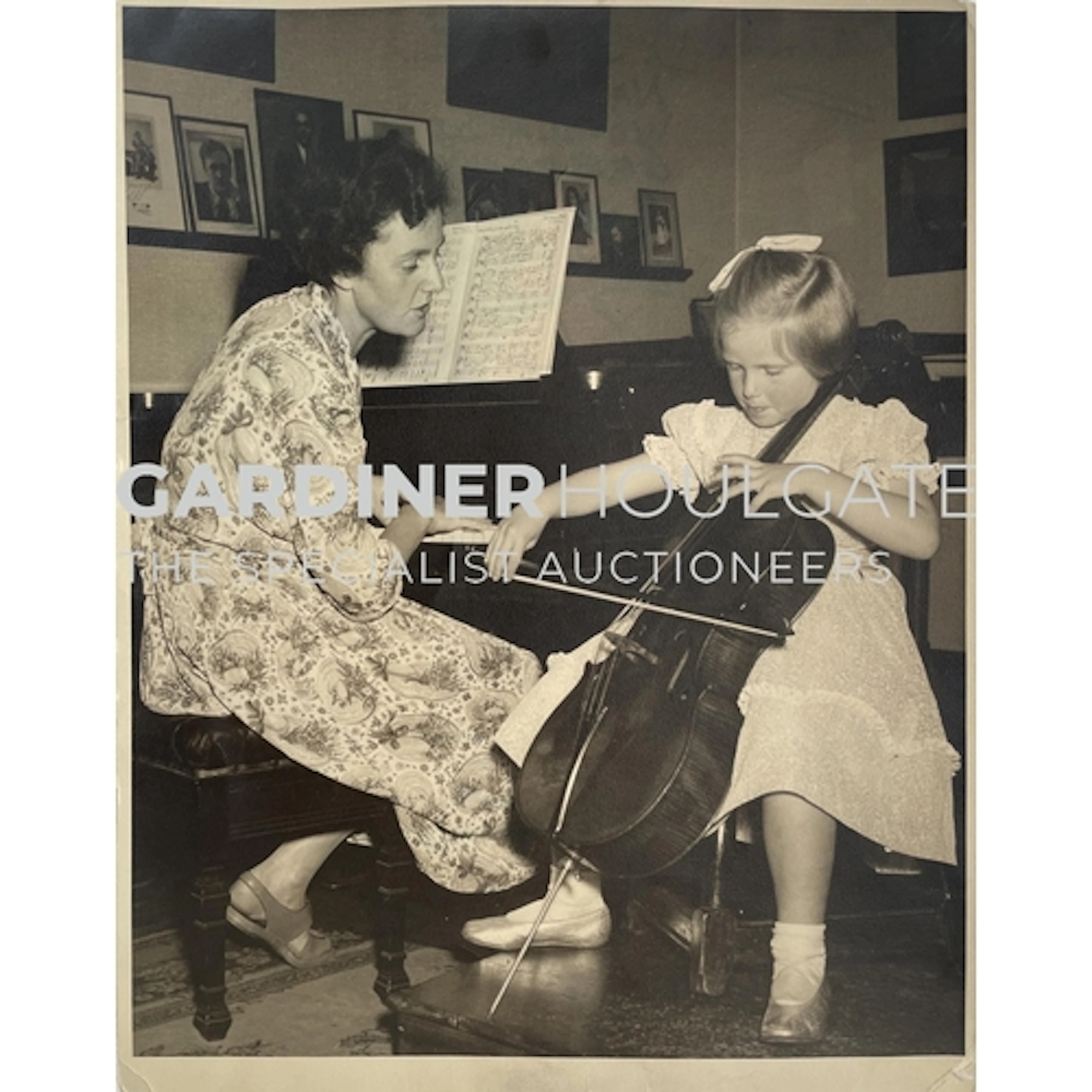 Photograph - Iris du Pré teaching a 6 year old Jacqueline du...