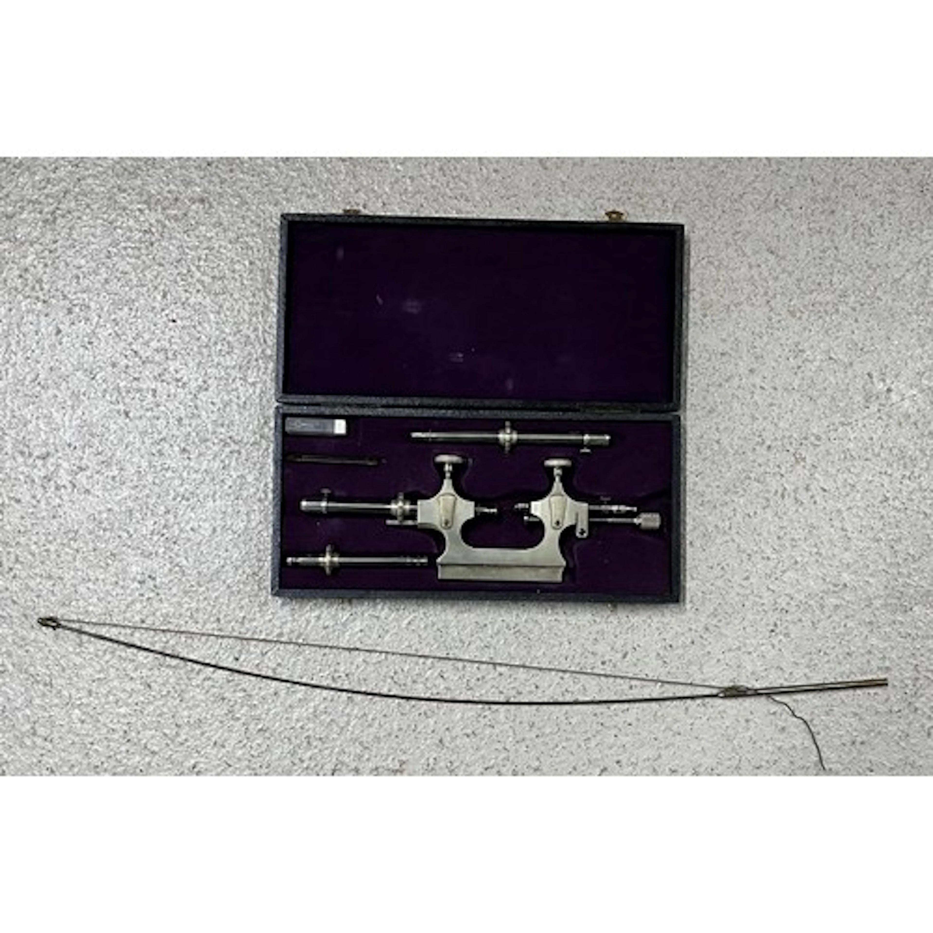 Antique hand turns, boxed; with a purpose-made steel bow...