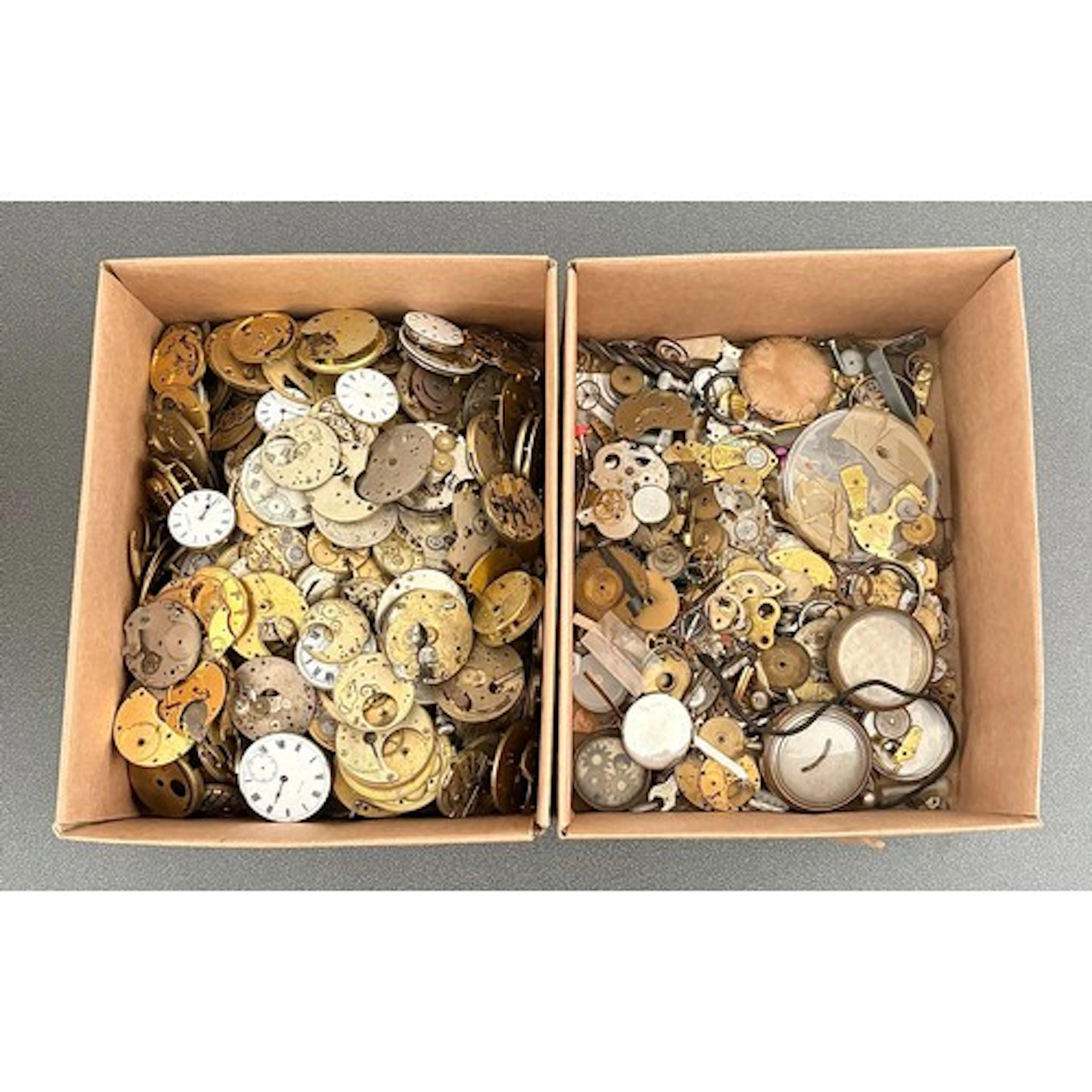 Large quantity of pocket watch movements/movement plates/par...