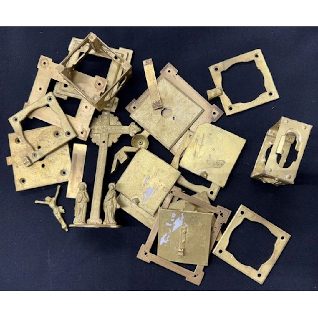 Selection of cast metal mounts from a mystery crucifix clock...